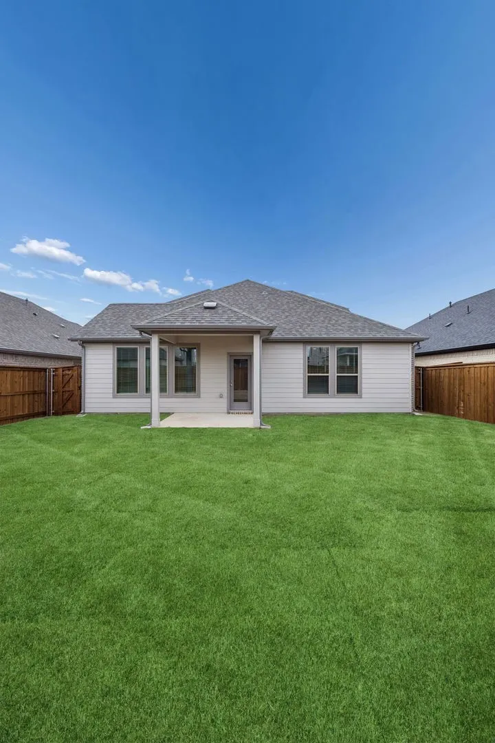 Covered Patio in the Stanley II home plan by Trophy Signature Homes – REPRESENTATIVE PHOTO