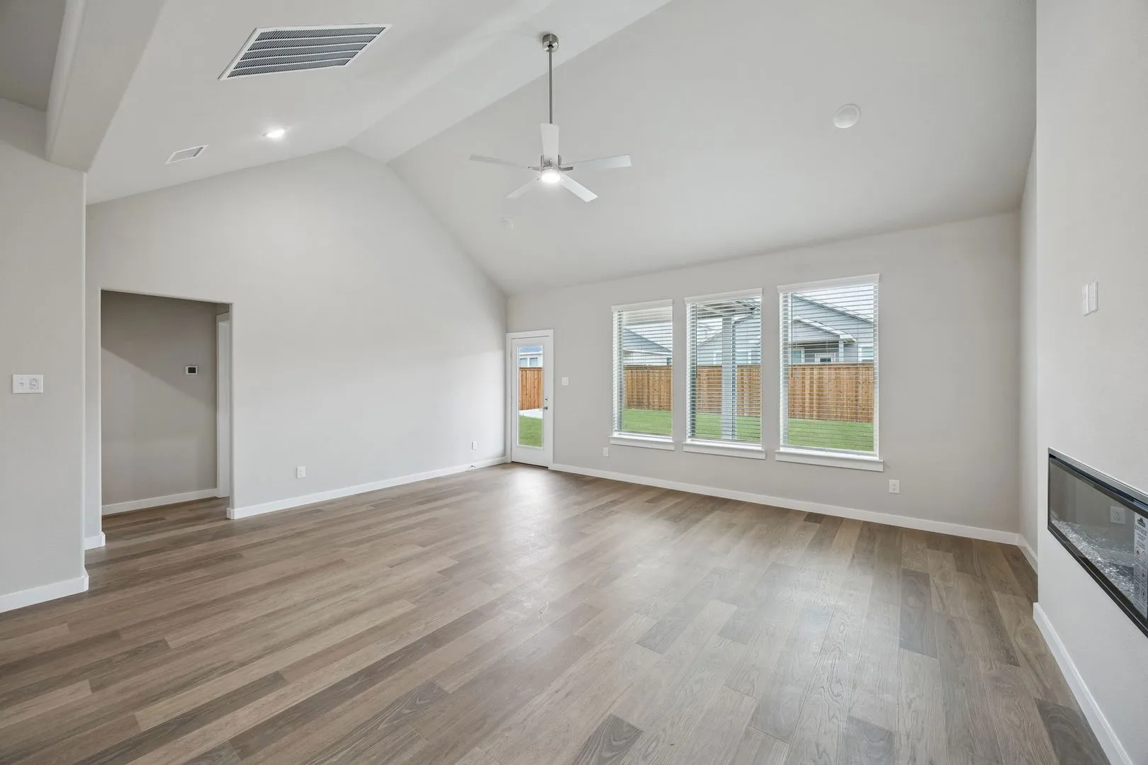 Living and Dining Rooms in the Stanley II home plan by Trophy Signature Homes – REPRESENTATIVE PH