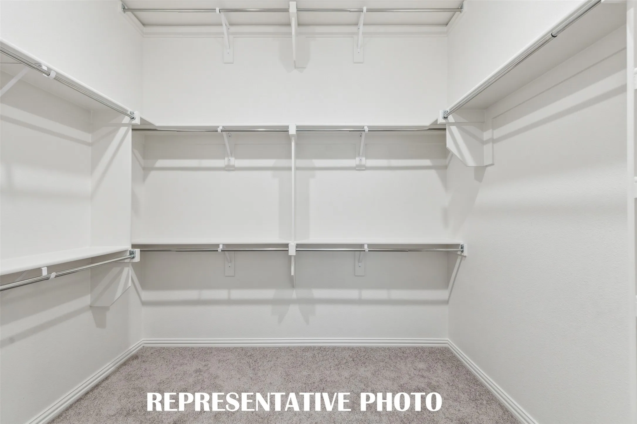 With outstanding space and seasonal hanging racks, your dream owner's closet awaits!!  REPRESENTATIVE PHOTO