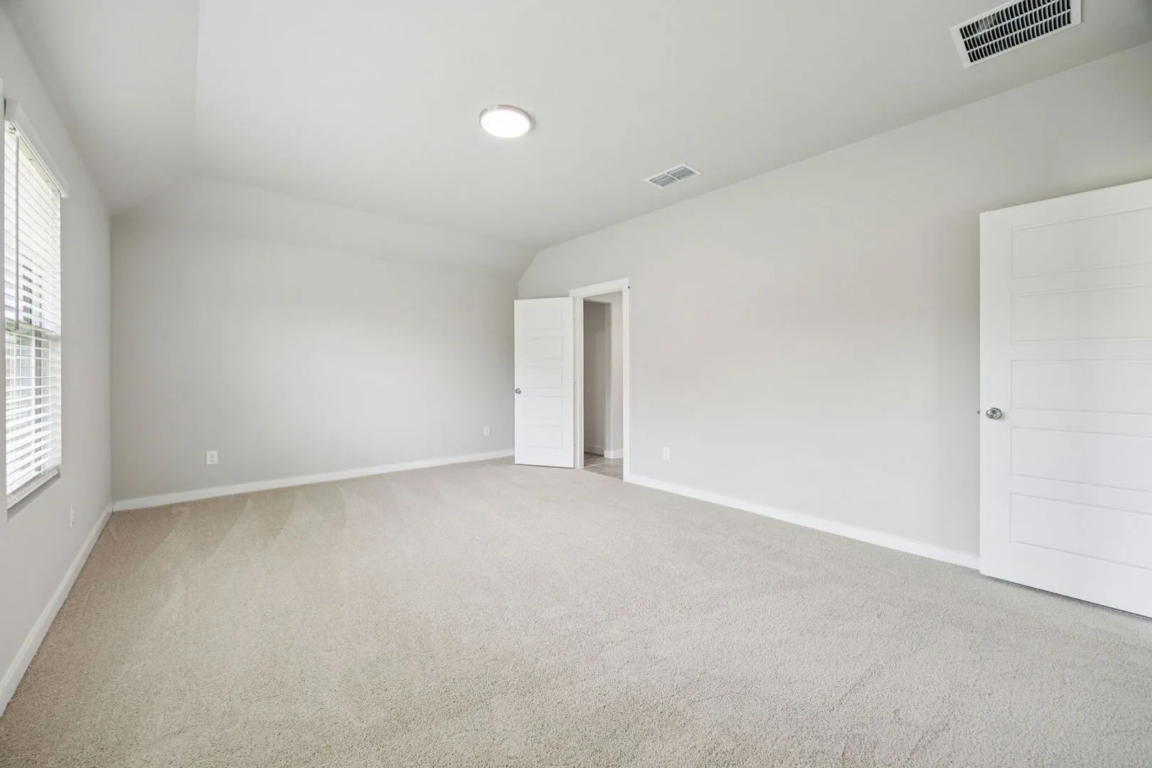 Primary Suite in the Hayden home plan by Trophy Signature Homes – REPRESENTATIVE PHOTO