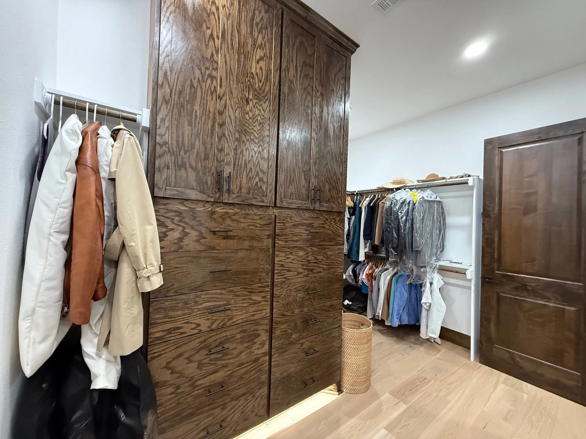 Walk in closet featuring light wood-type flooring