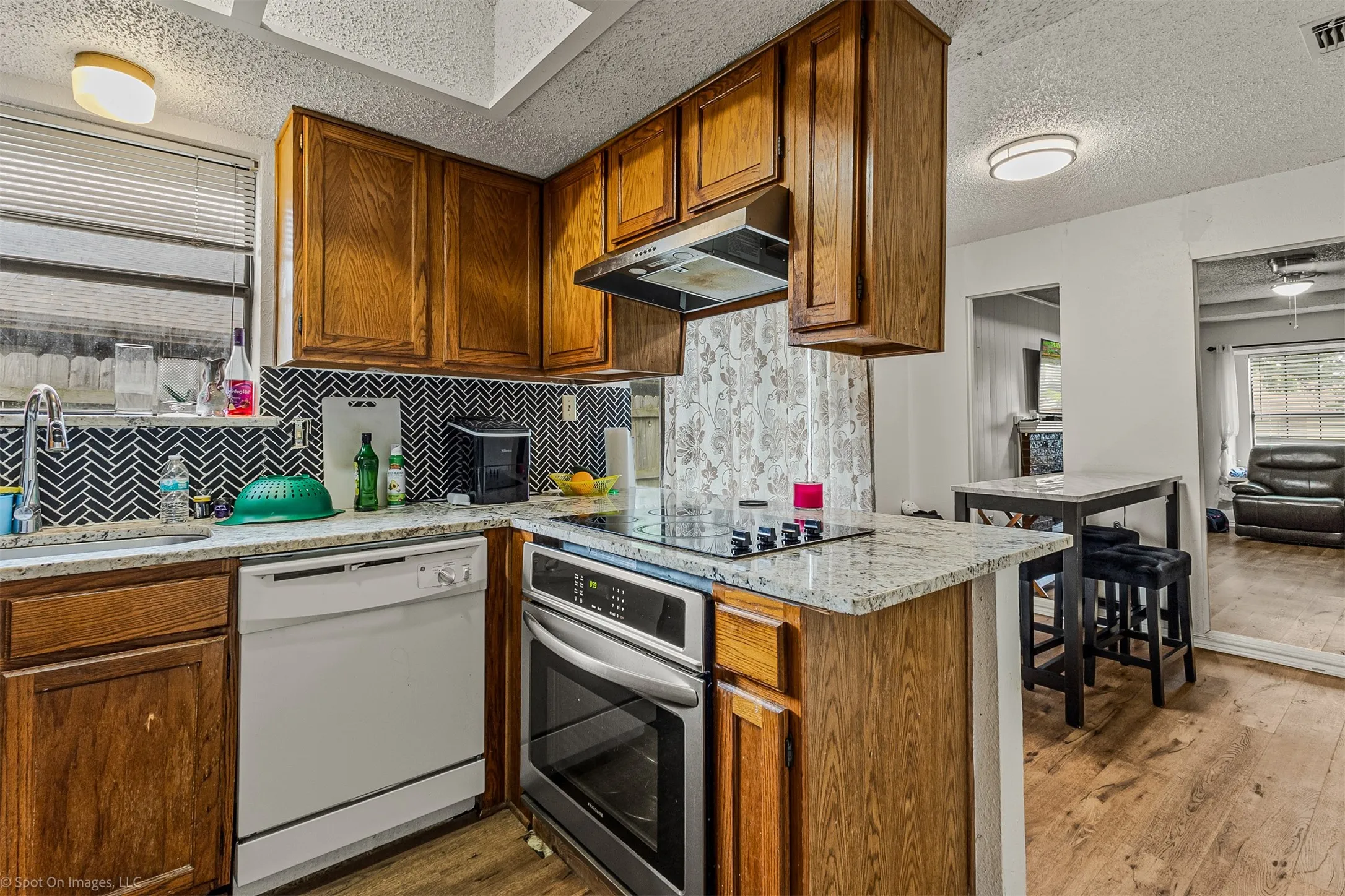 Another view of the kitchen in Unit B