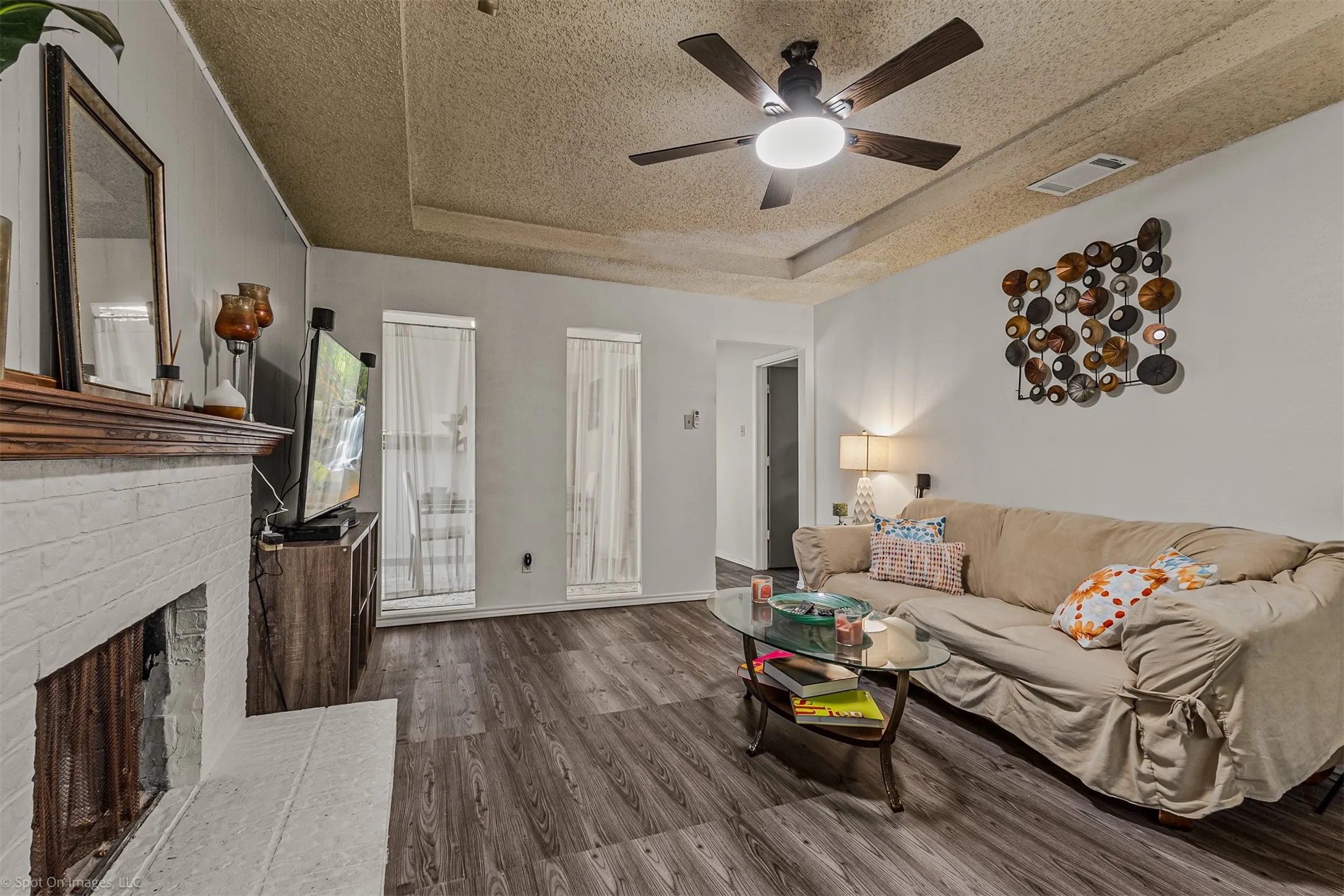 View of Unit A living room toward kitchen