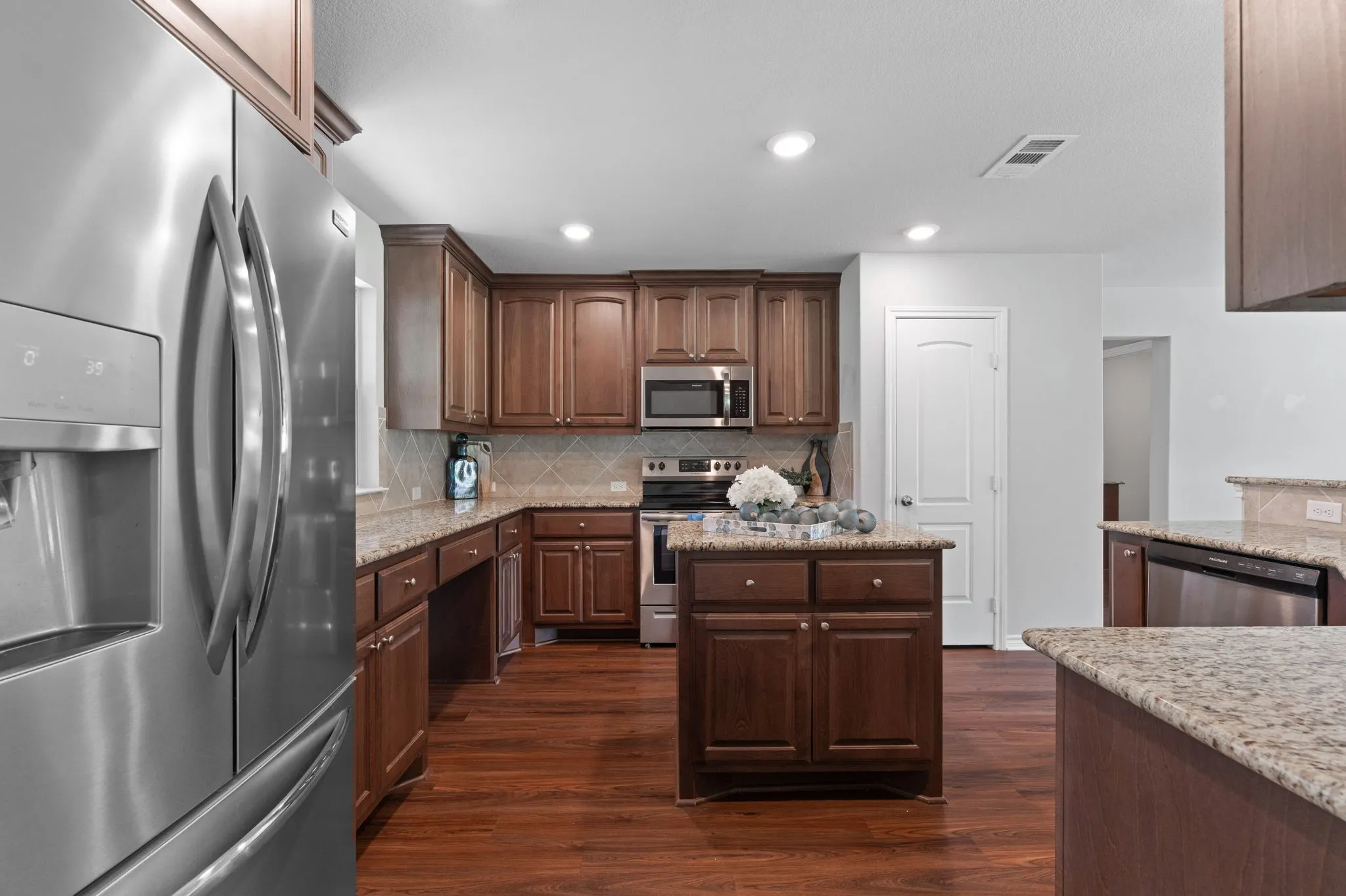 Kitchen with large walk in pantry