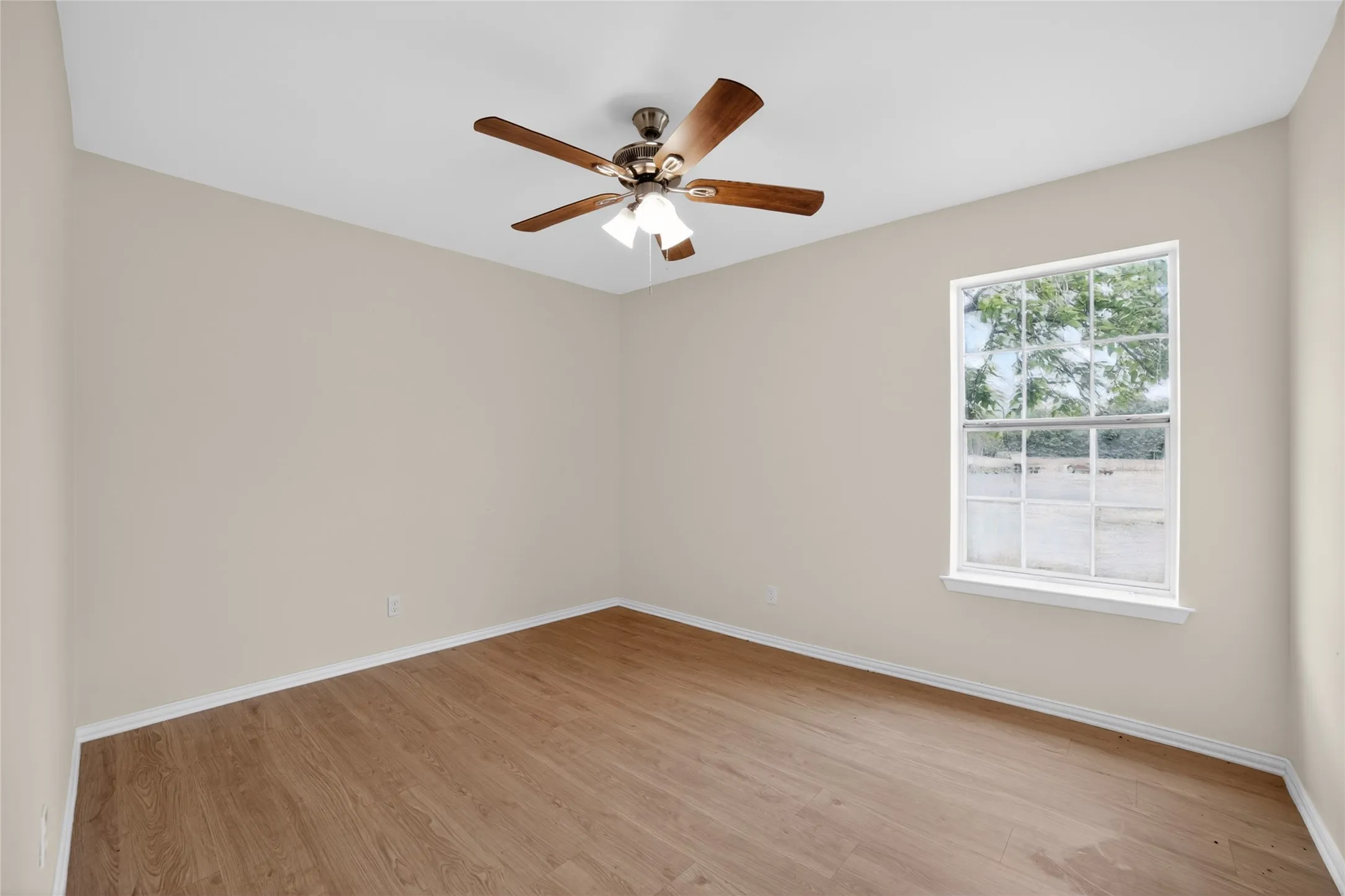 This interior space features light-colored walls and wood-look flooring
