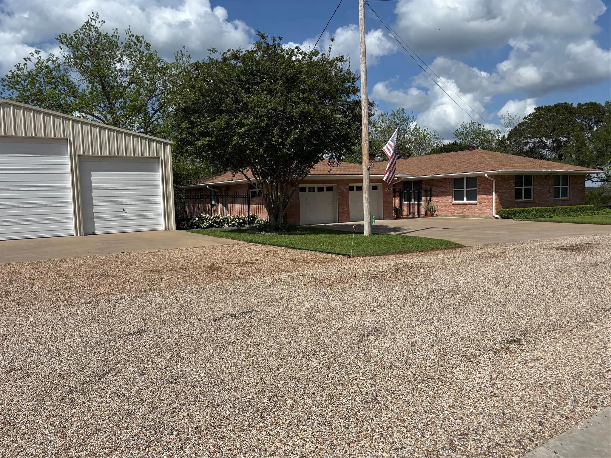 Large Ranch-style home, garage and a huge metal building with guest apartment or studio. includes full bath, Be sure to open all the pictures.  And even more spectacular to experience in person.