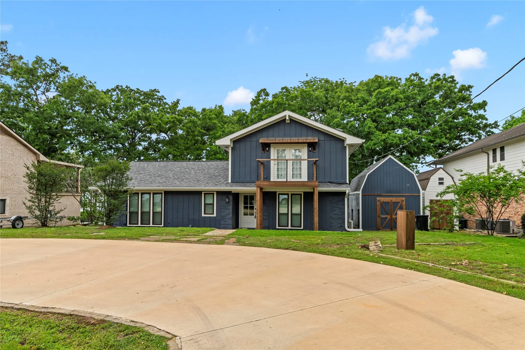 Street Side View with circle driveway with plenty of parking!