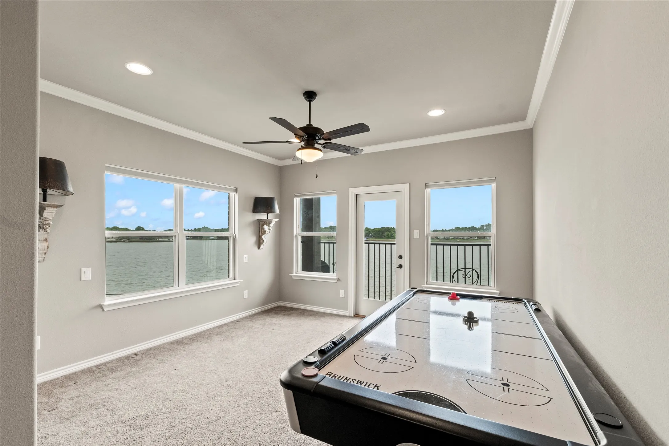 Upstair bonus room opens to balcony with elevated water views