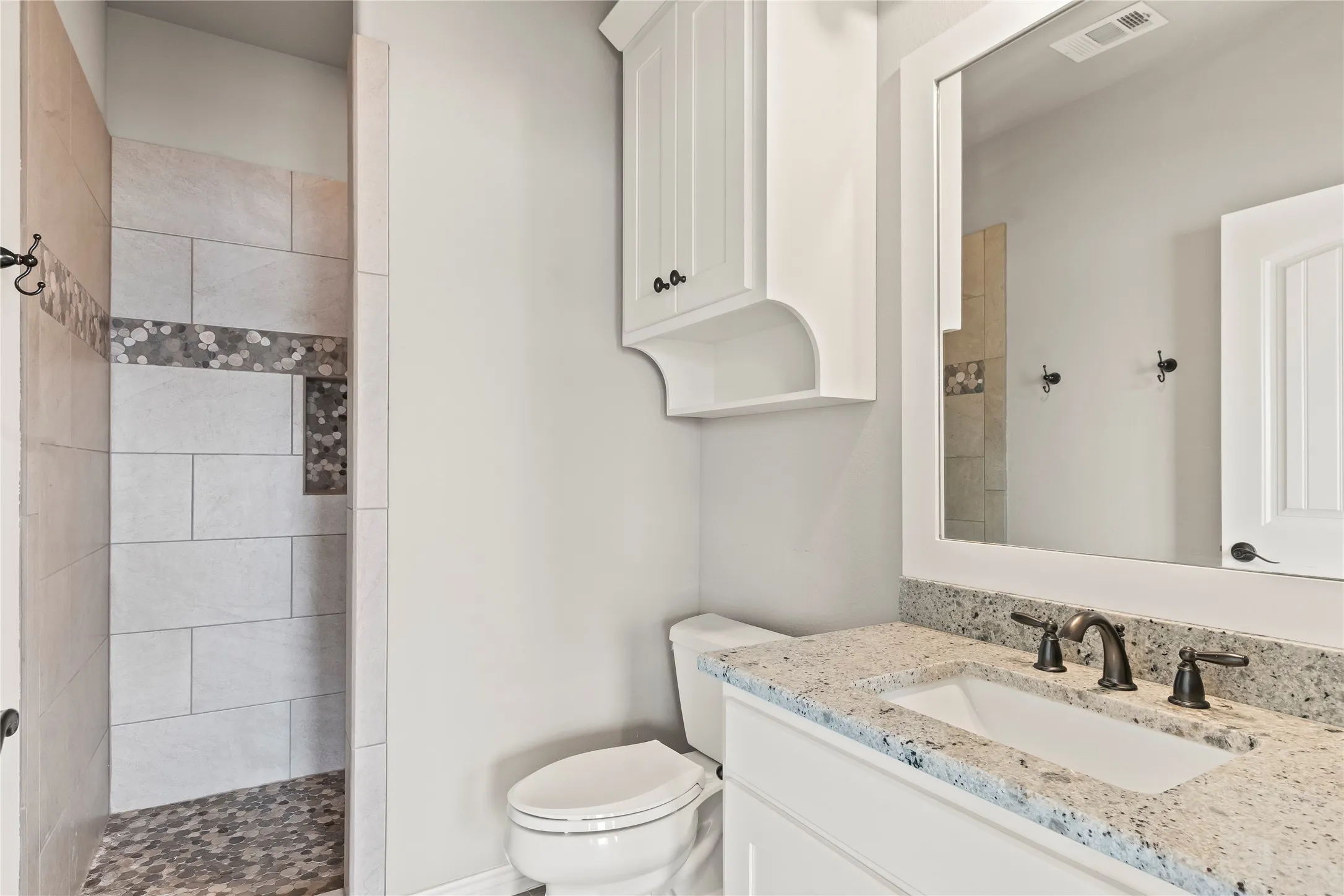 Upstair full 4th bath with large walk in shower for bedroom 4 and gameroom, bonus room.