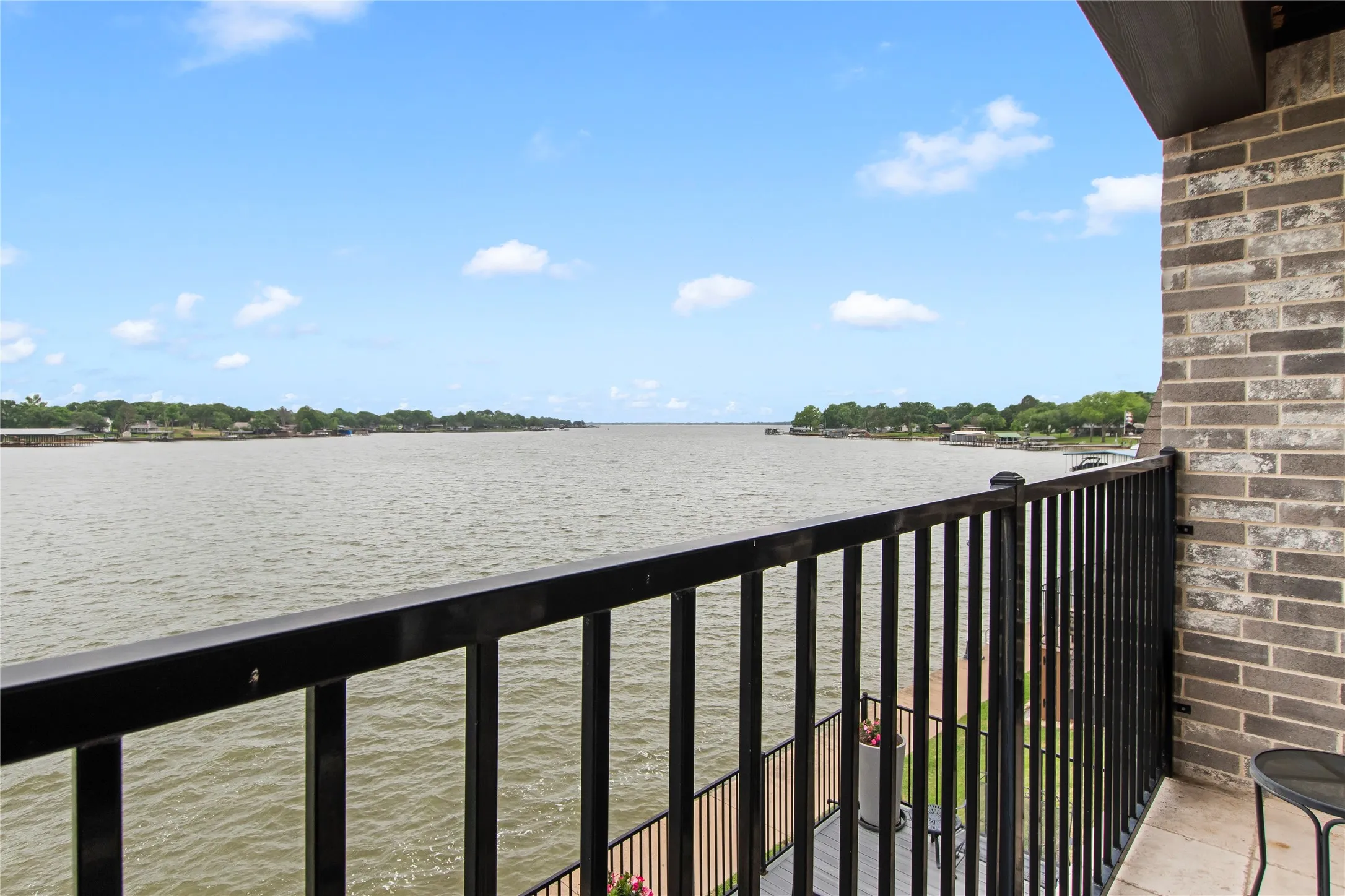 Balcony off the bonus  room provides wonderful elevated water views and another place for outdoor enjoyment.