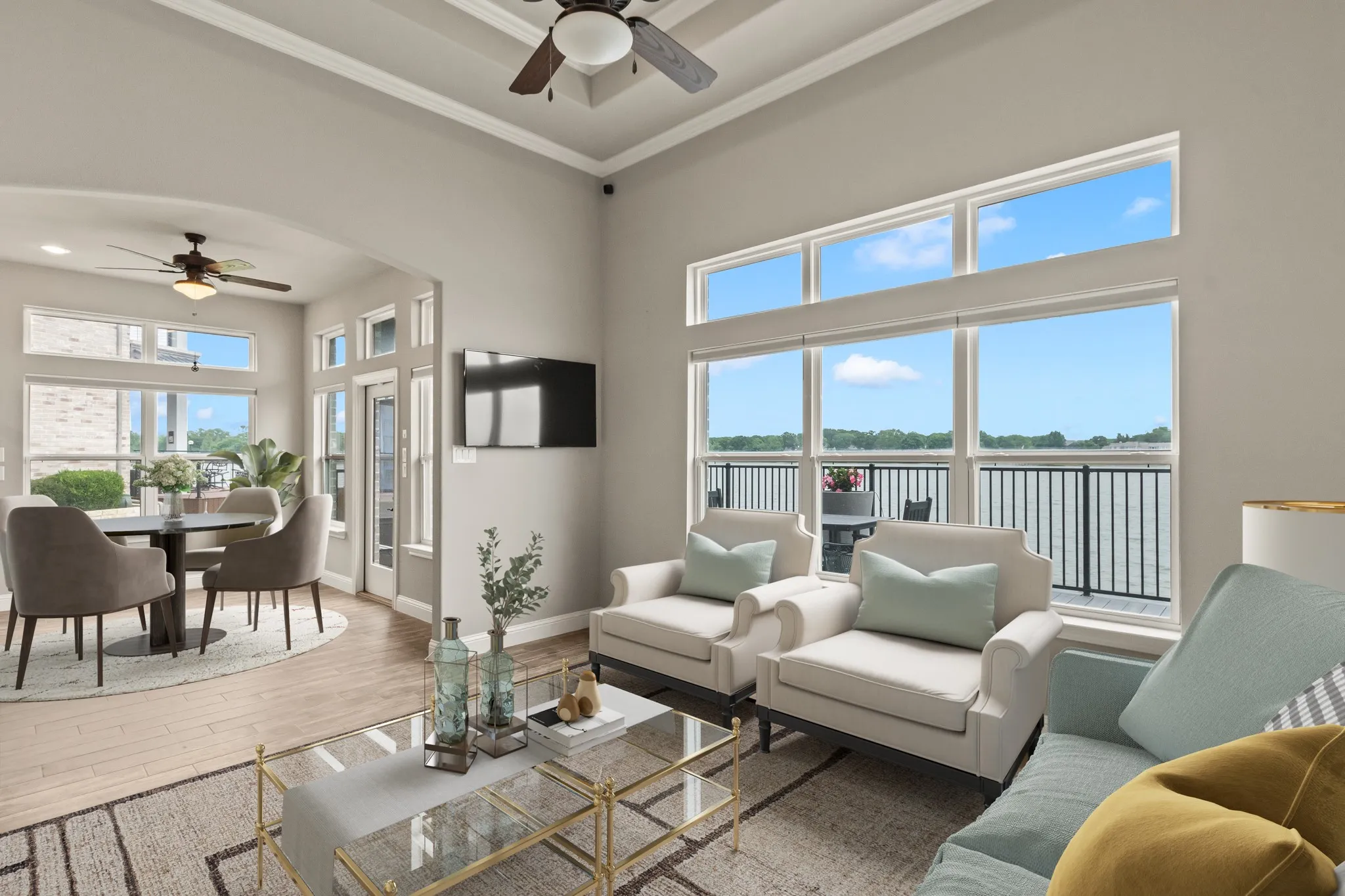 Staged Photo* Living and dining rooms with fantastic water views.