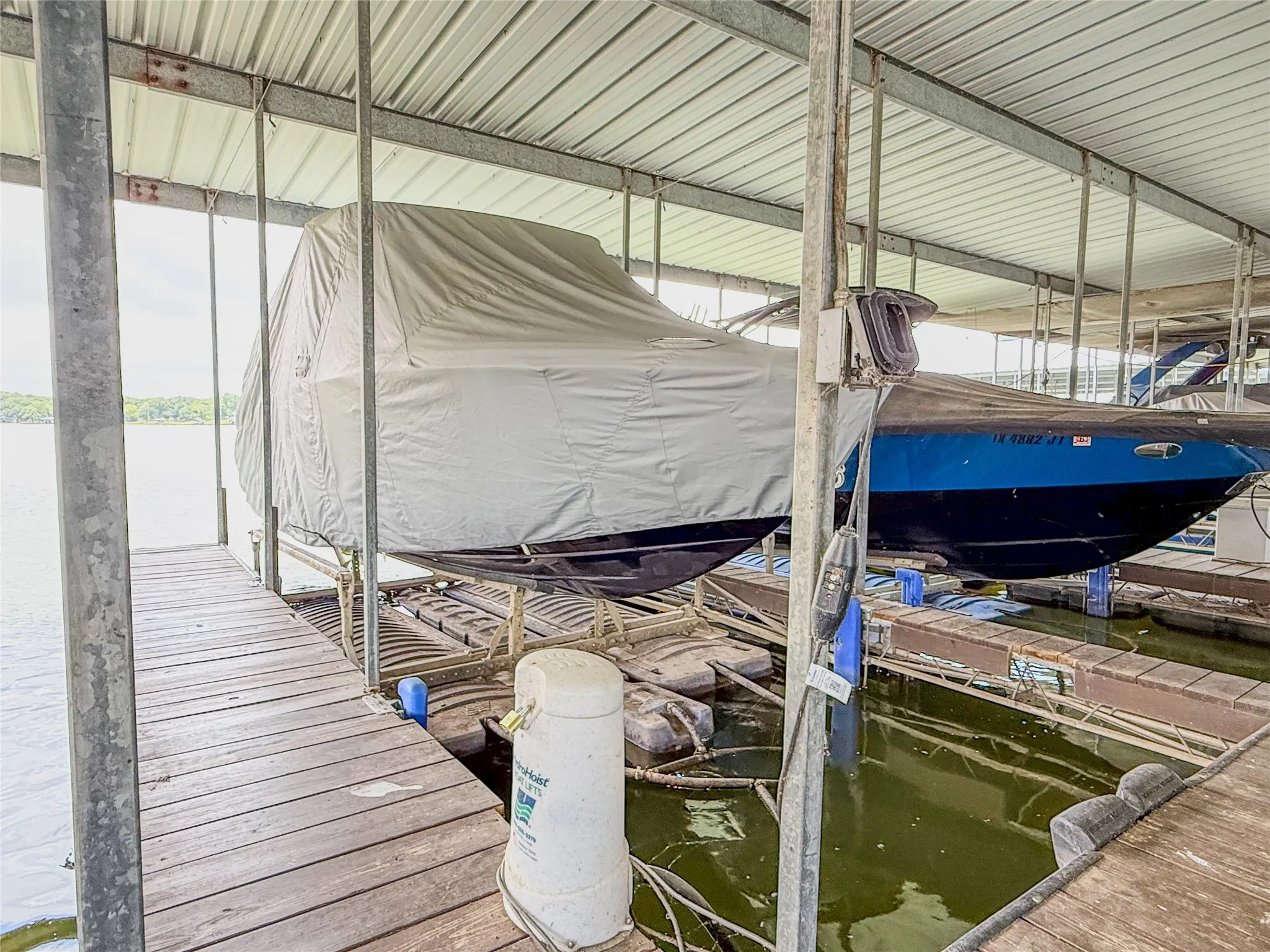 Includes boatslip #8 with HydroHoist lift. Watercraft not included.