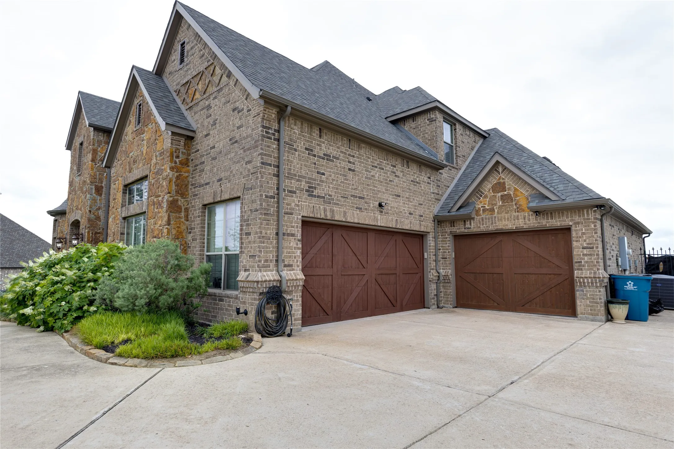 3 car garage with extended parking area