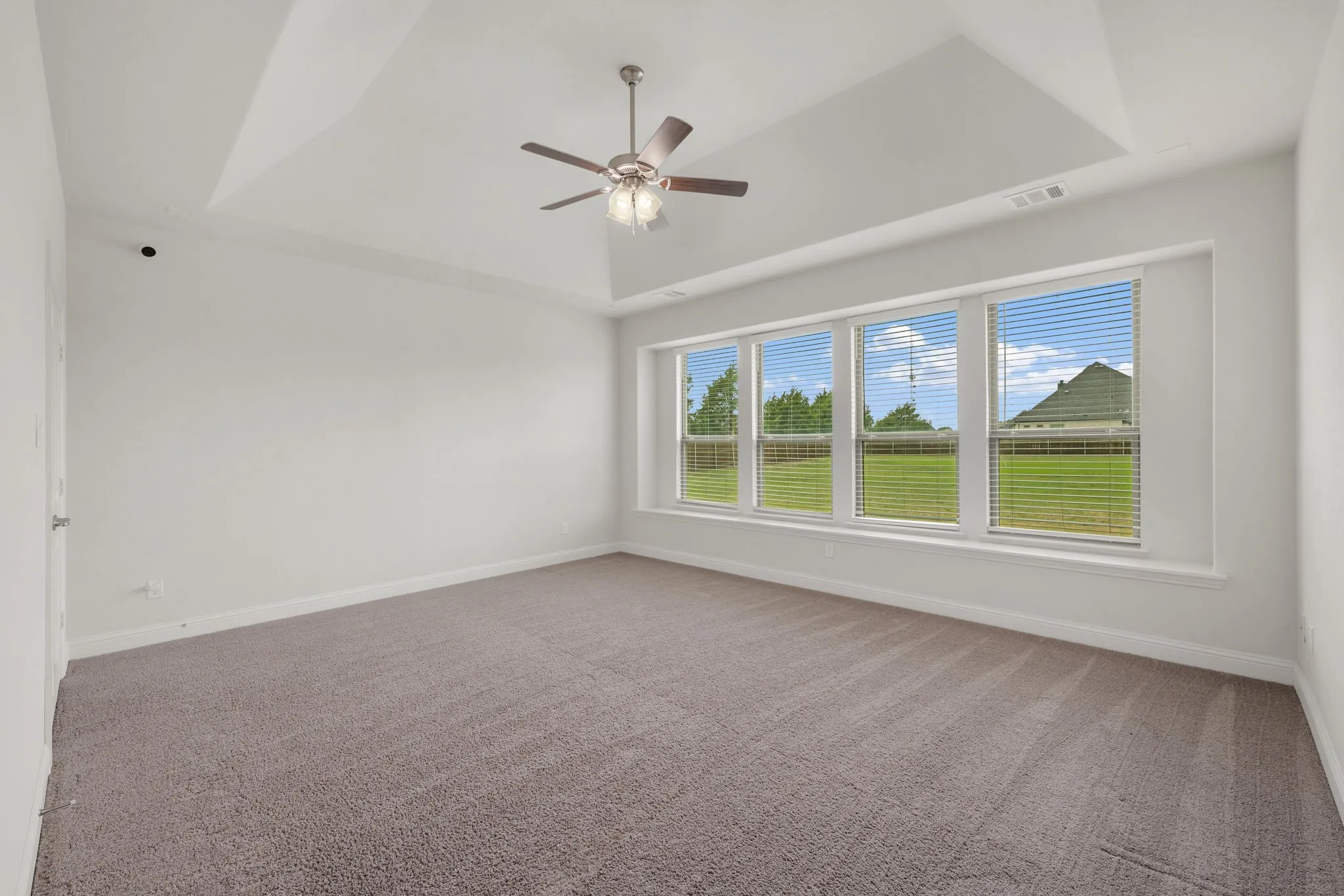 Huge game room with windows and view of the backyard