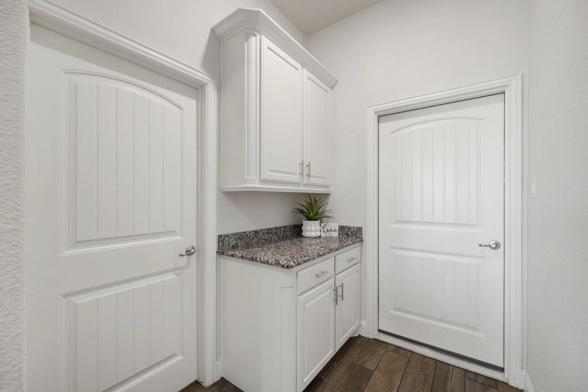 Extra cabinets near the kitchen, laundry and gym