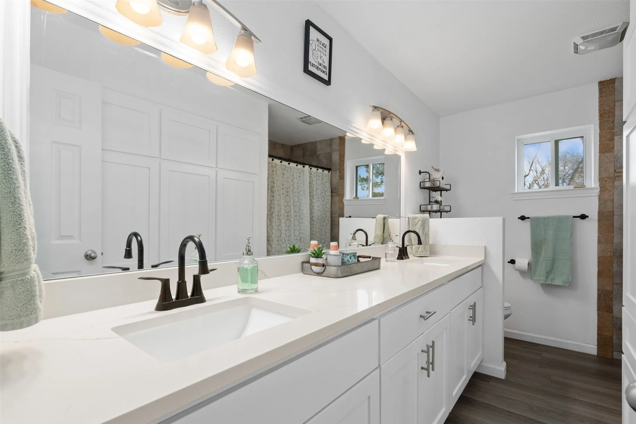 Hall bathroom has an extra long double vanity with quartz counters!
