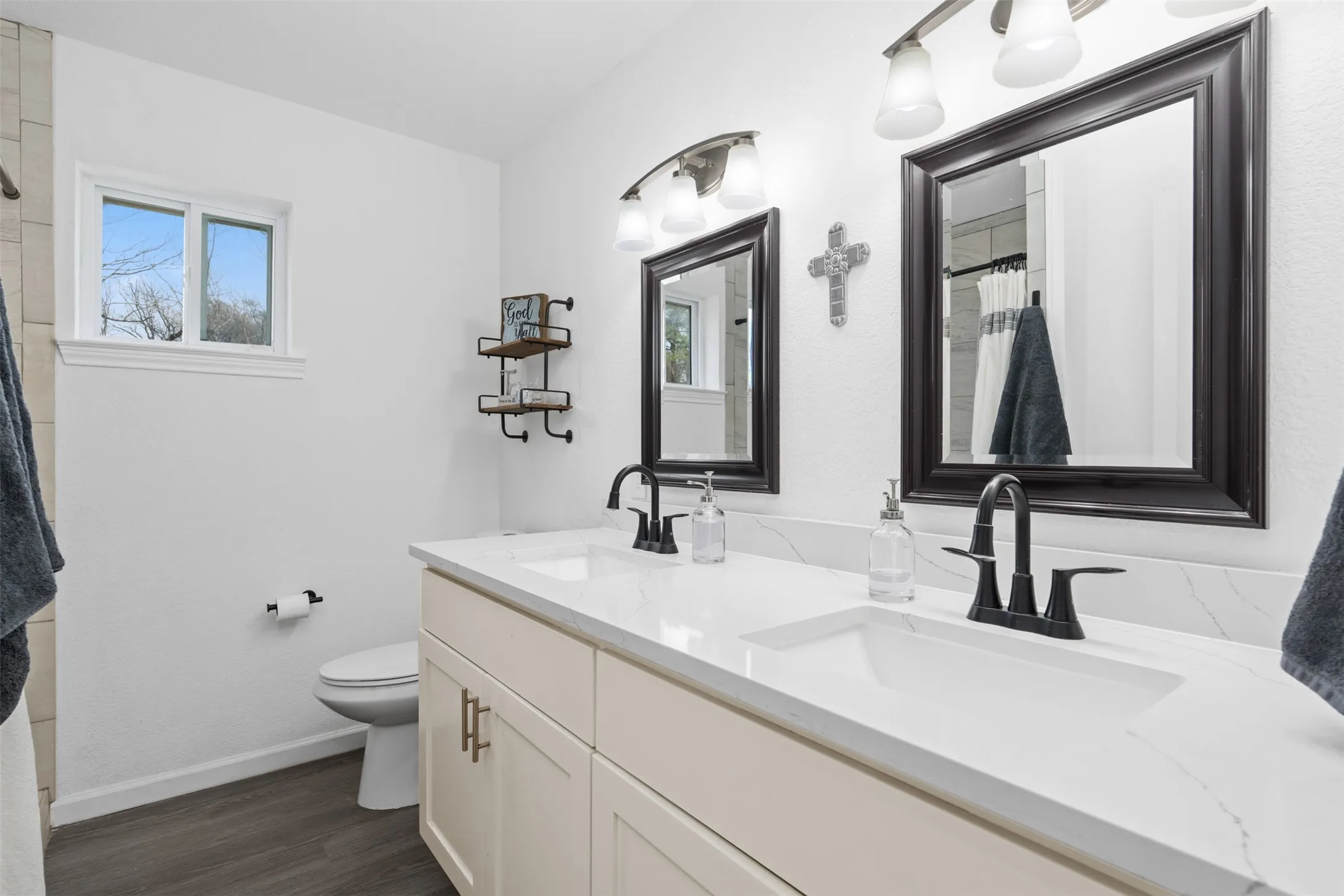 Primary bathroom has large double vanity with great storage!