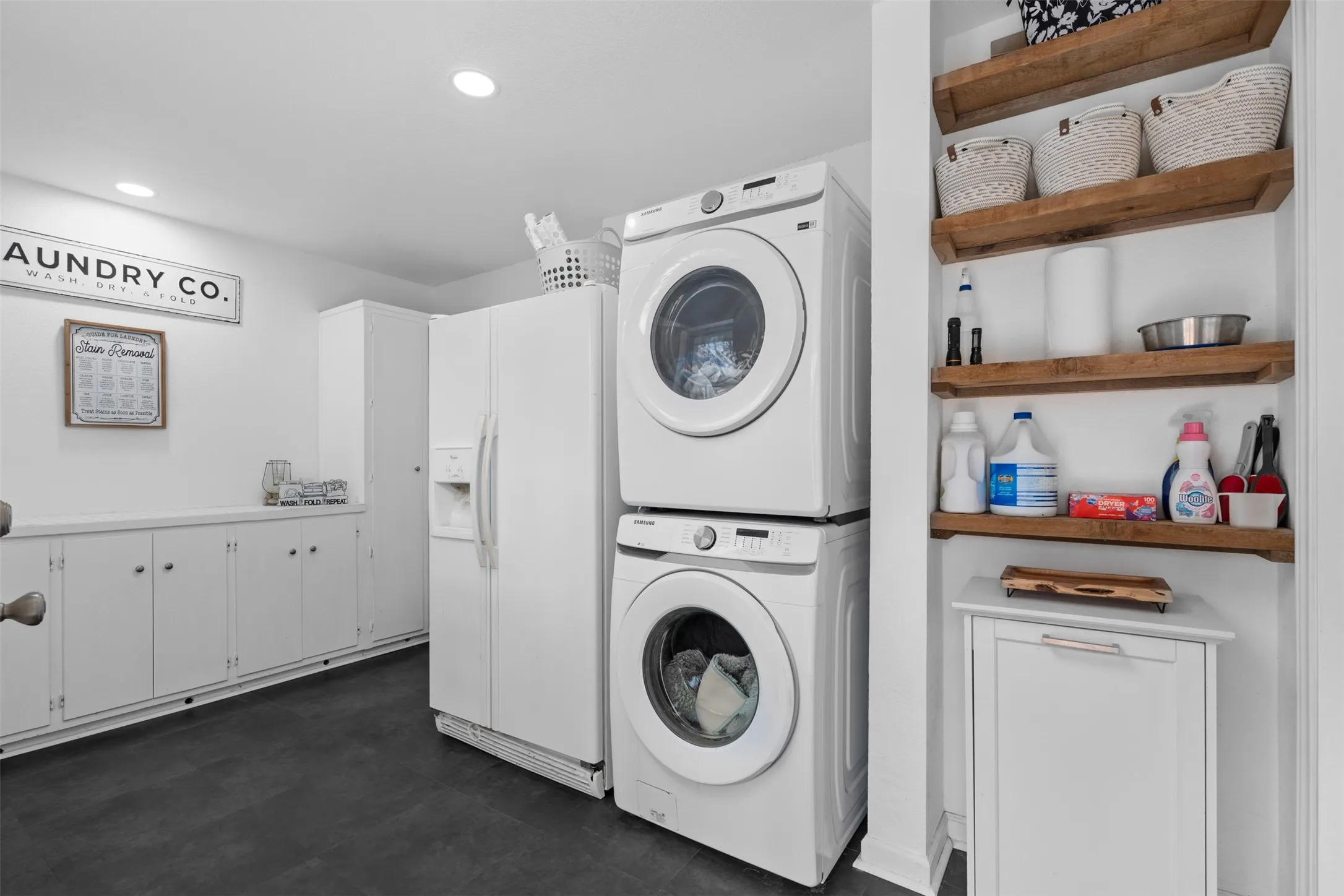 HUGE laundry room with plenty of space for an extra refrigerator!