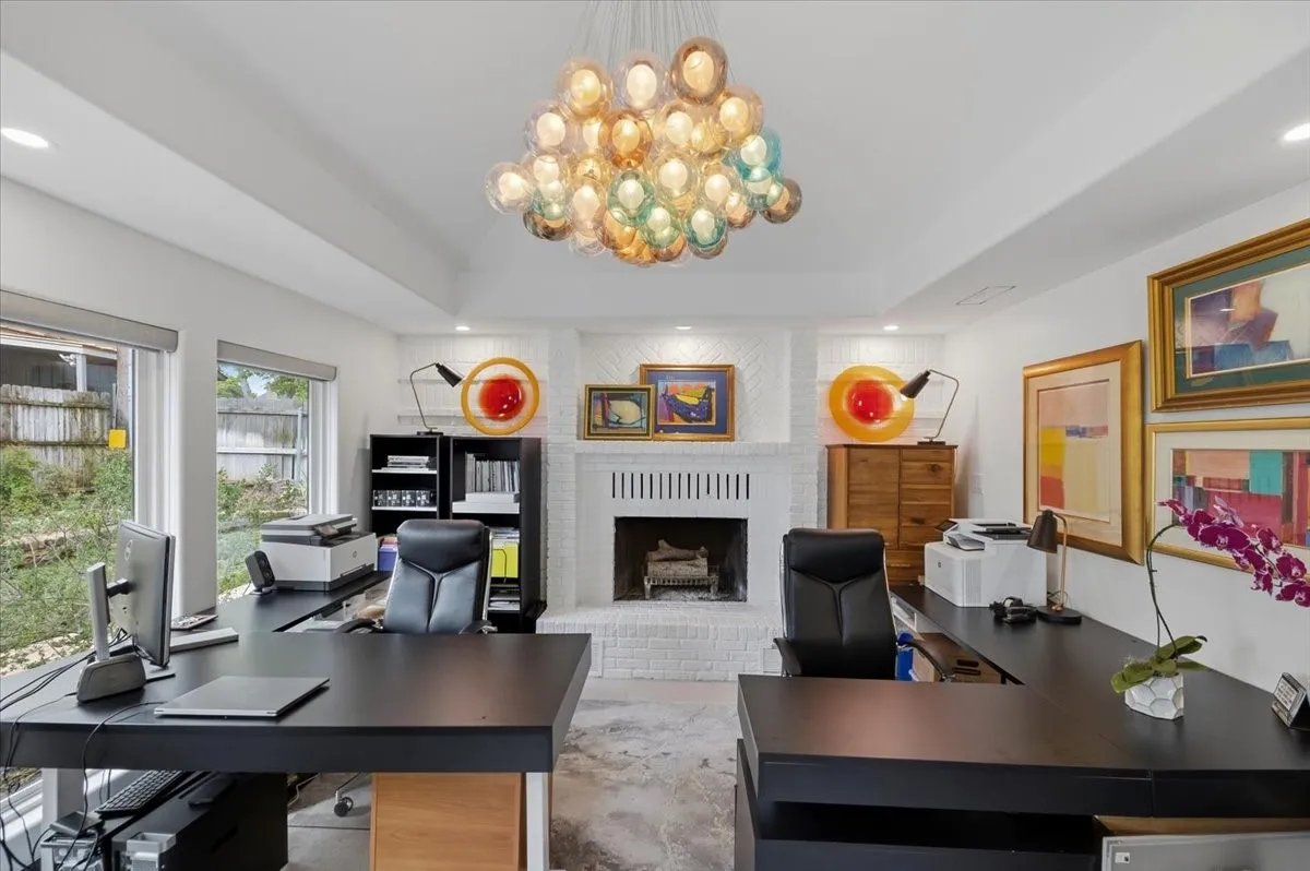 Office featuring  a brick fireplace