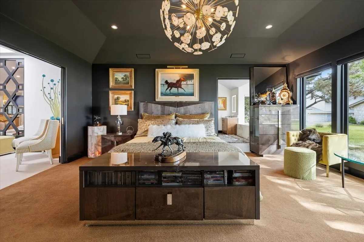 Primary BR with elegant design and window view of the lake