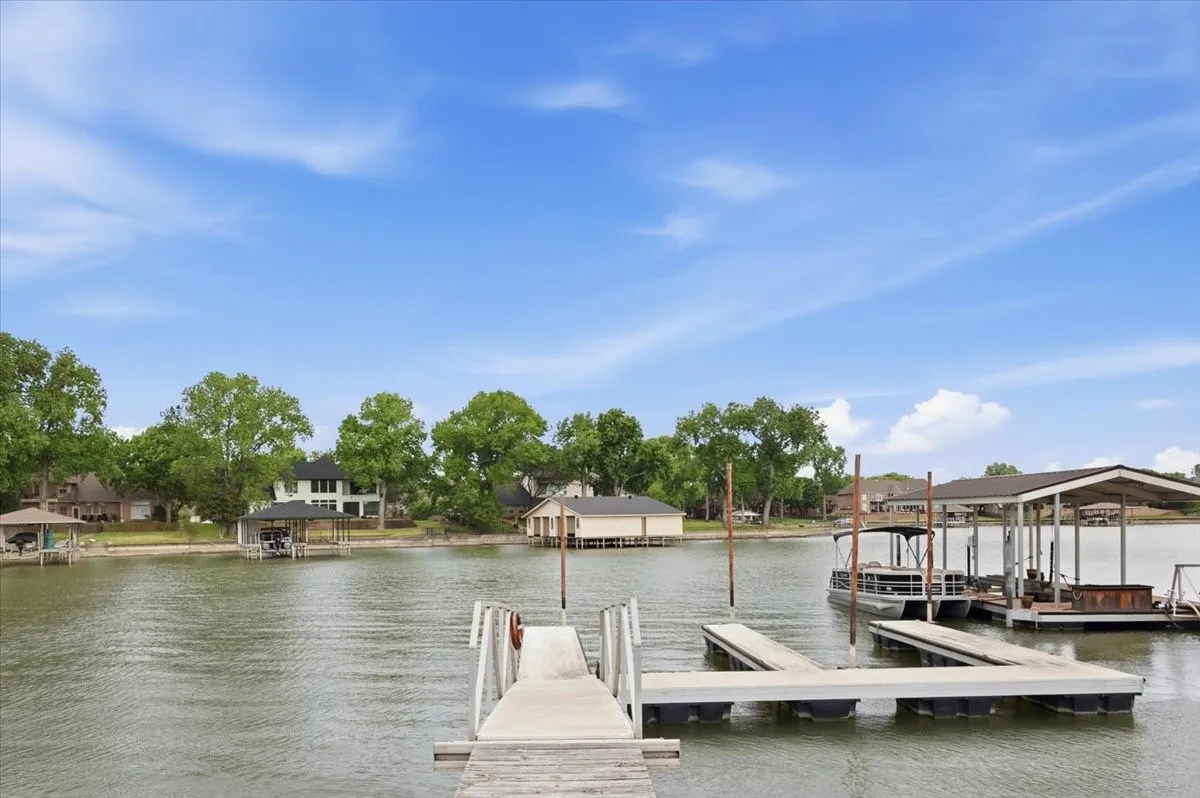 Community boat dock with boat launch for direct access to the water