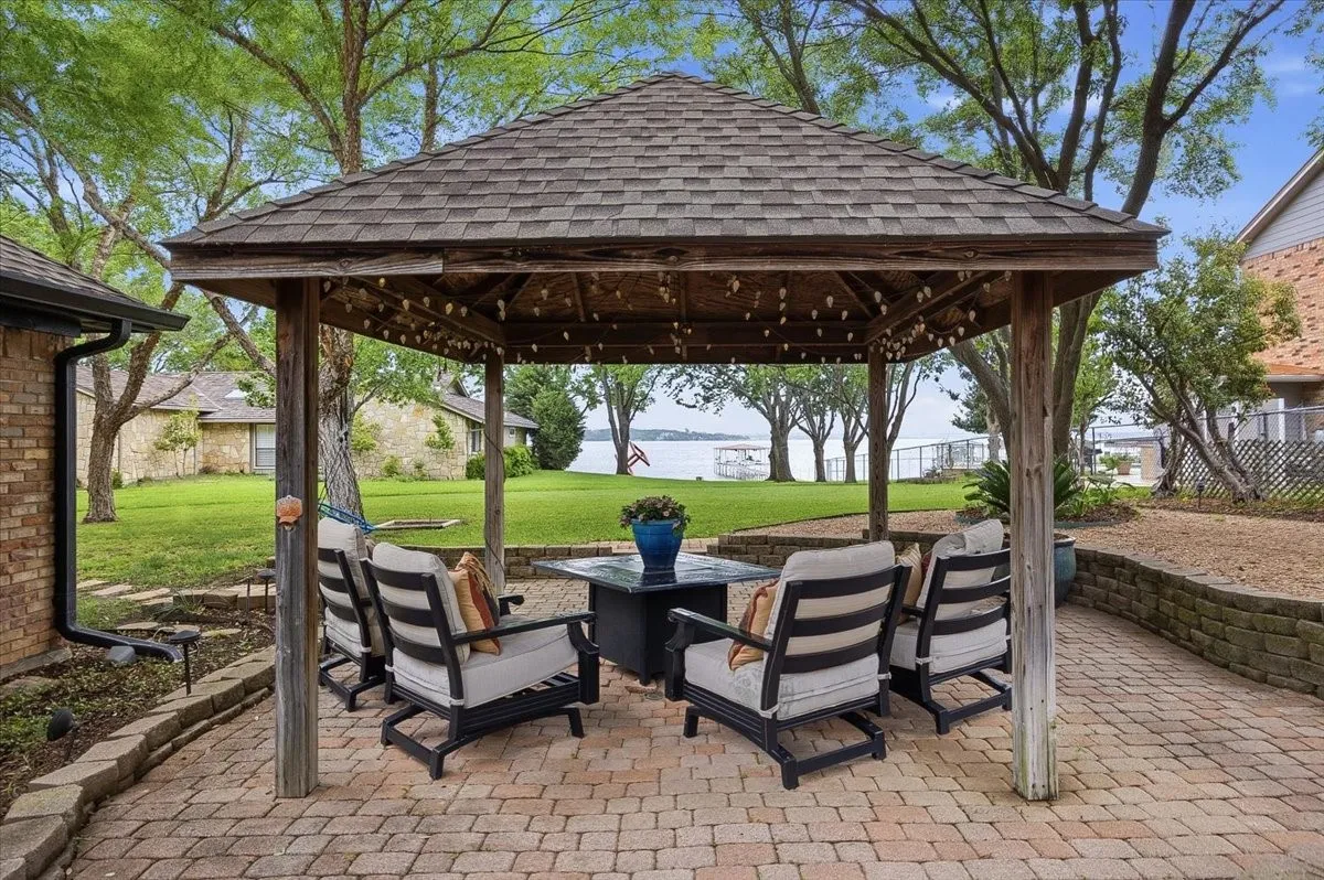 Covered seating w fire pit table for stunning lake views
