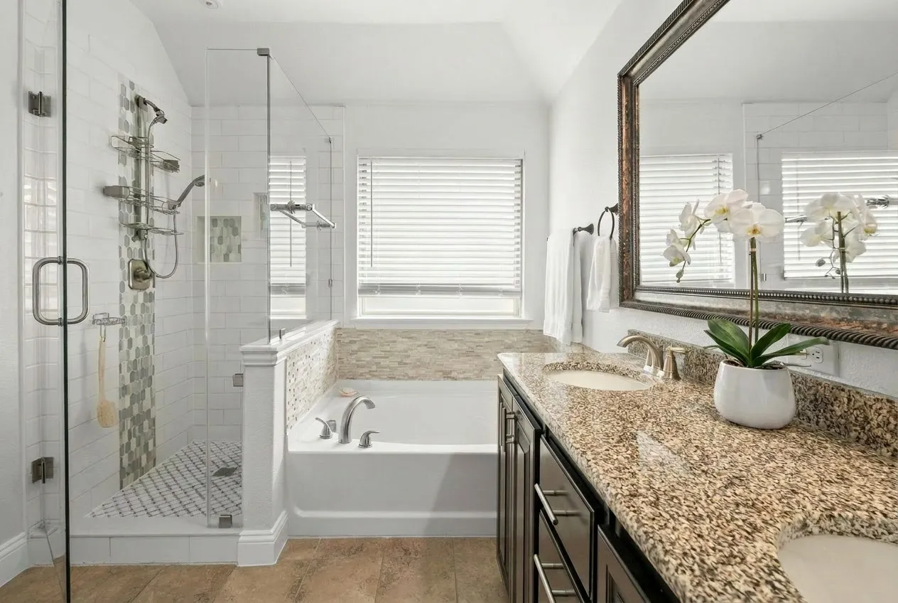 Primary bath on second floor with rimless shower.
