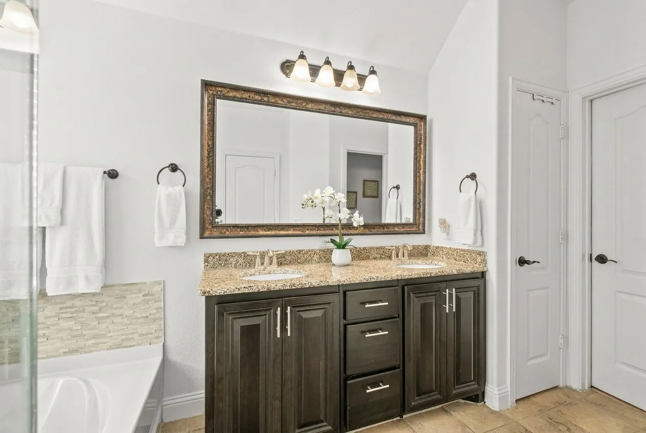 Primary bath on second level with large walk-in closet.