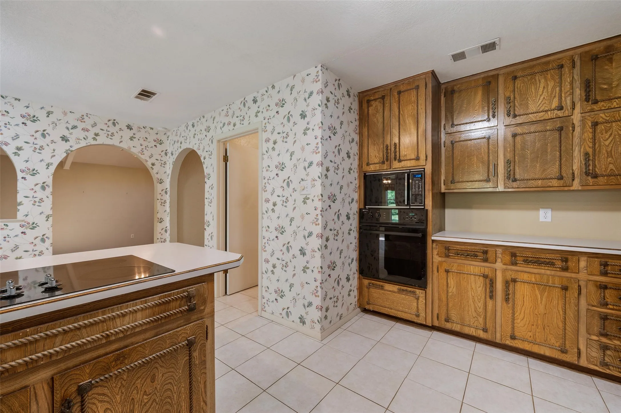 Unique rich wood cabinetry.
