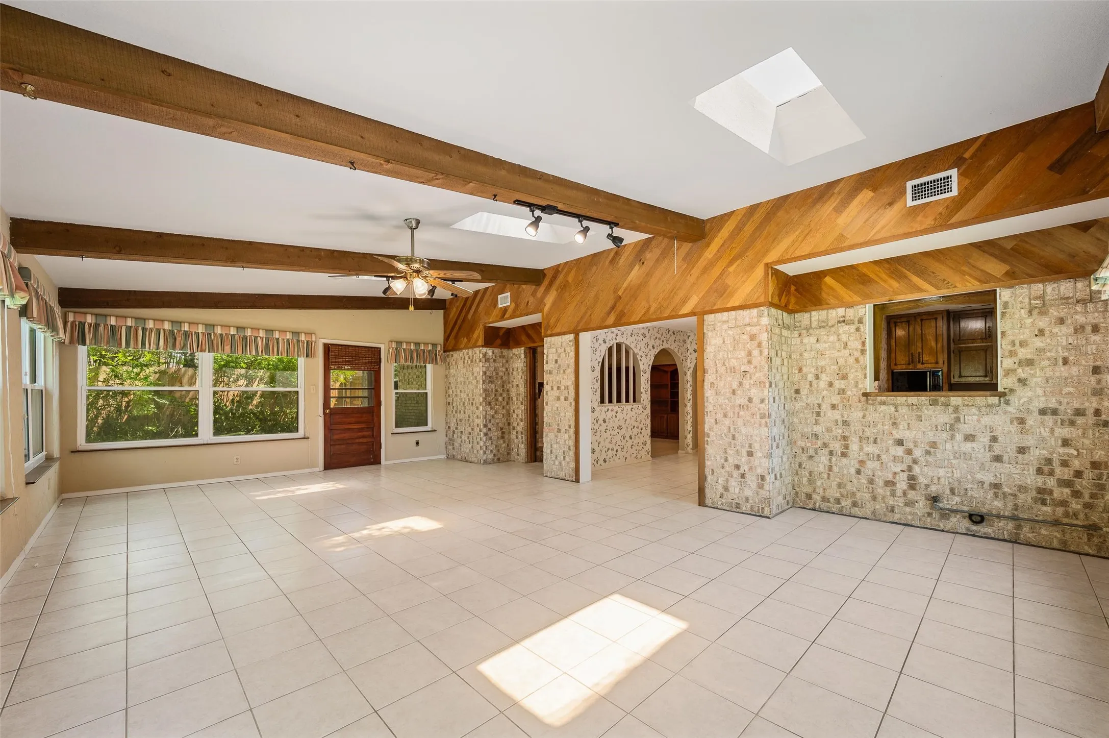 Stunning beamed ceiling in large 2nd living area.
