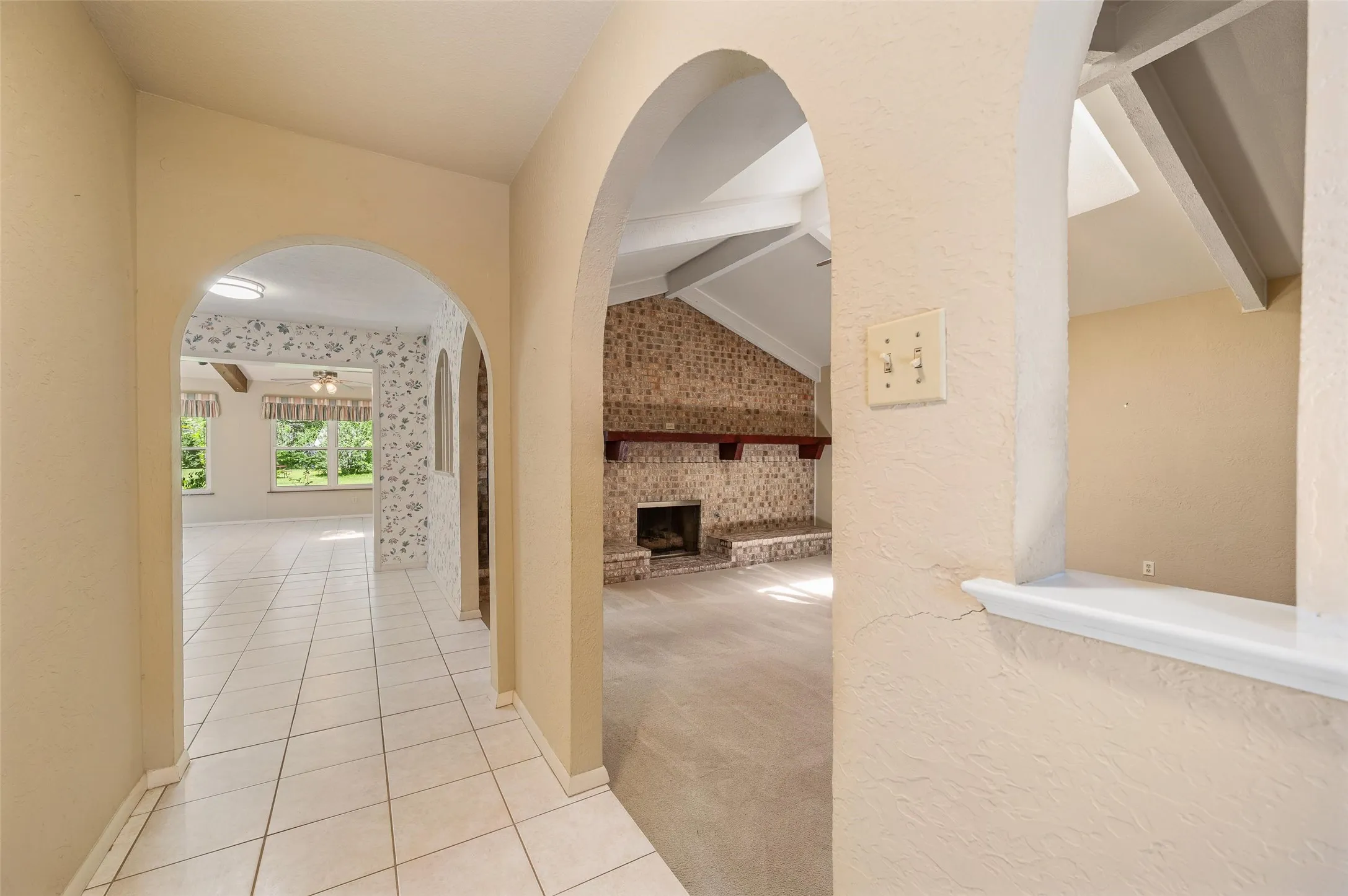 Stunning arched doorways welcome you to this beautiful home.