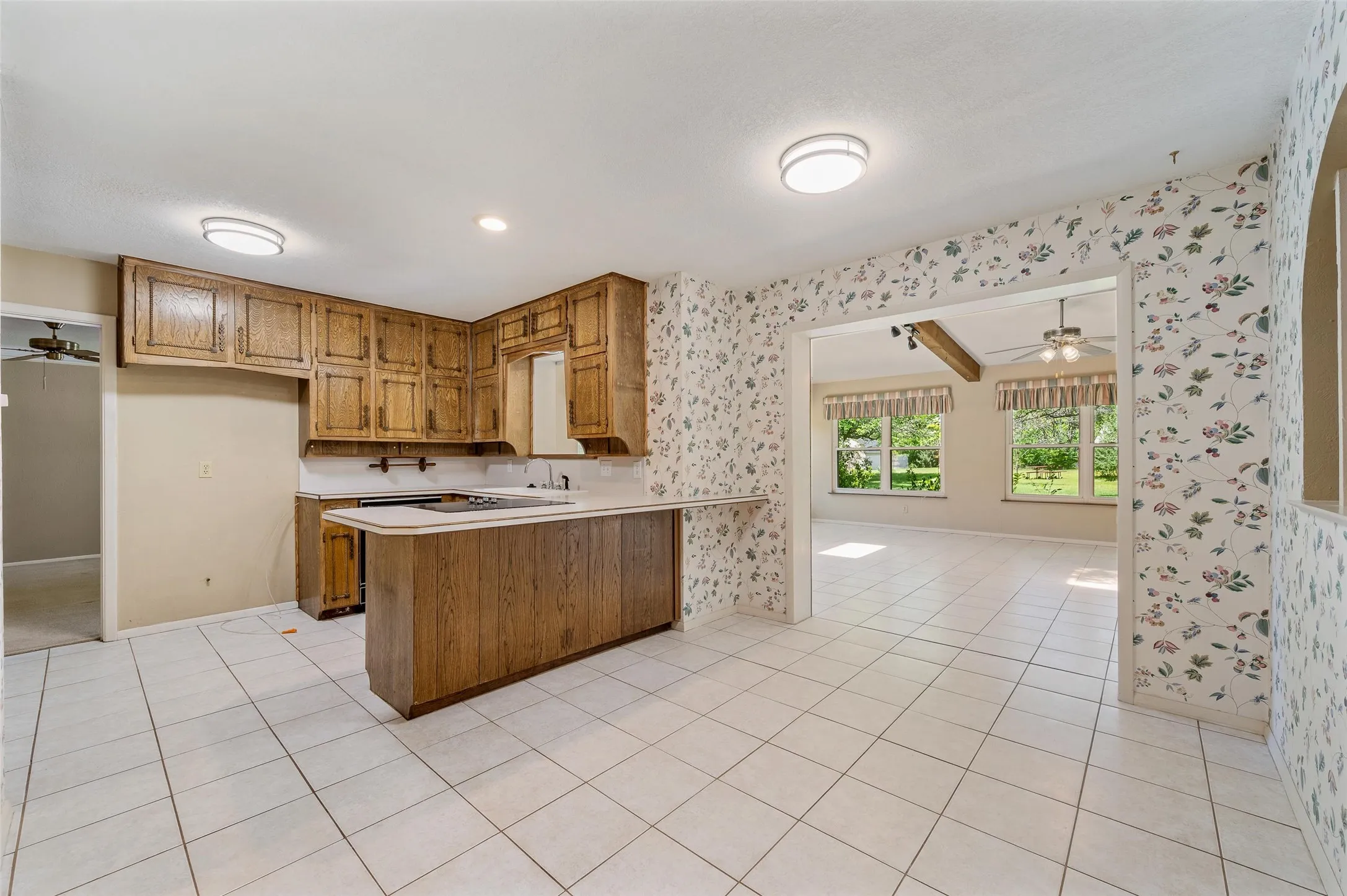Roomy kitchen open to both living areas.
