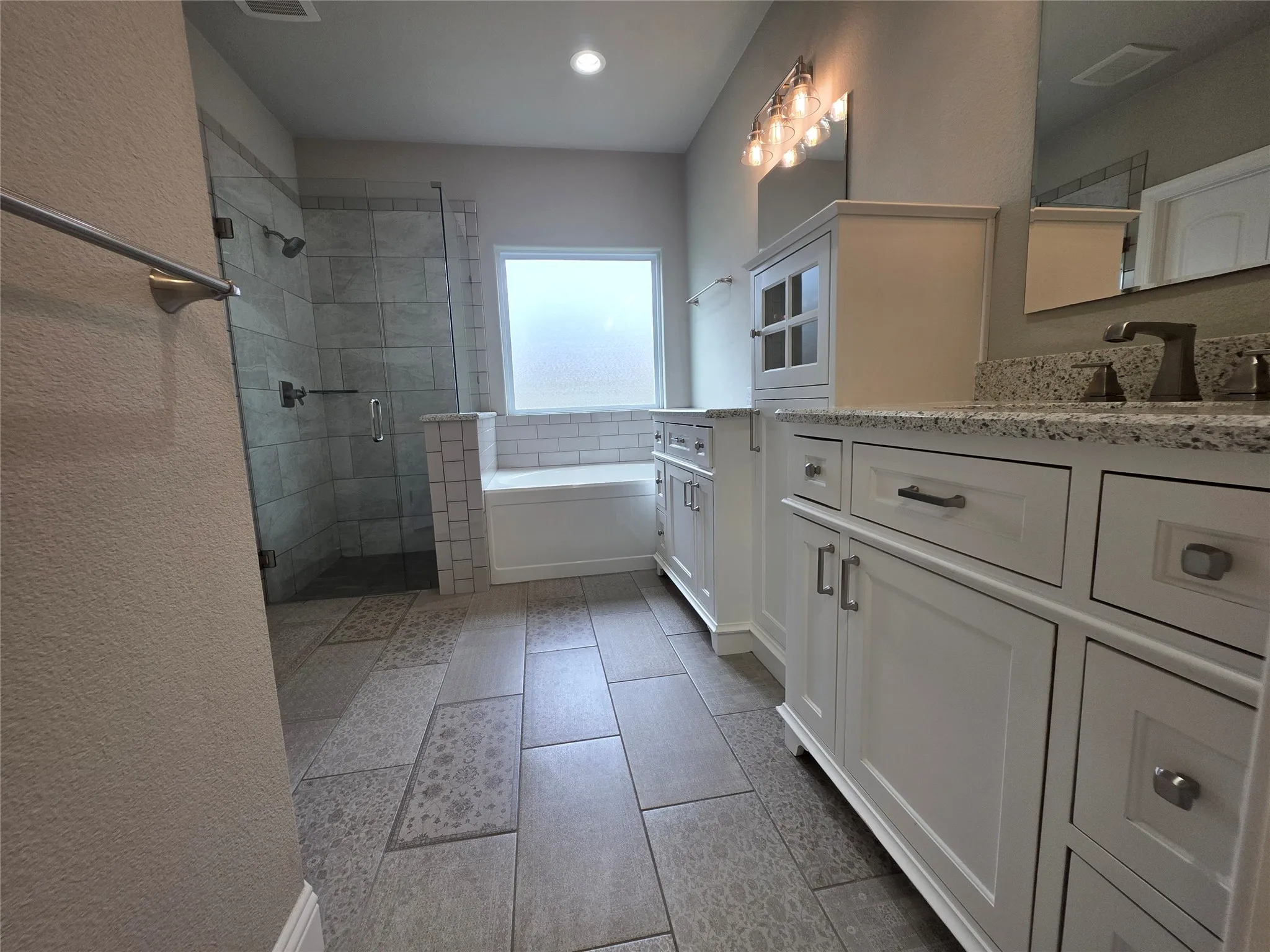 master bathroom has lots of storage
