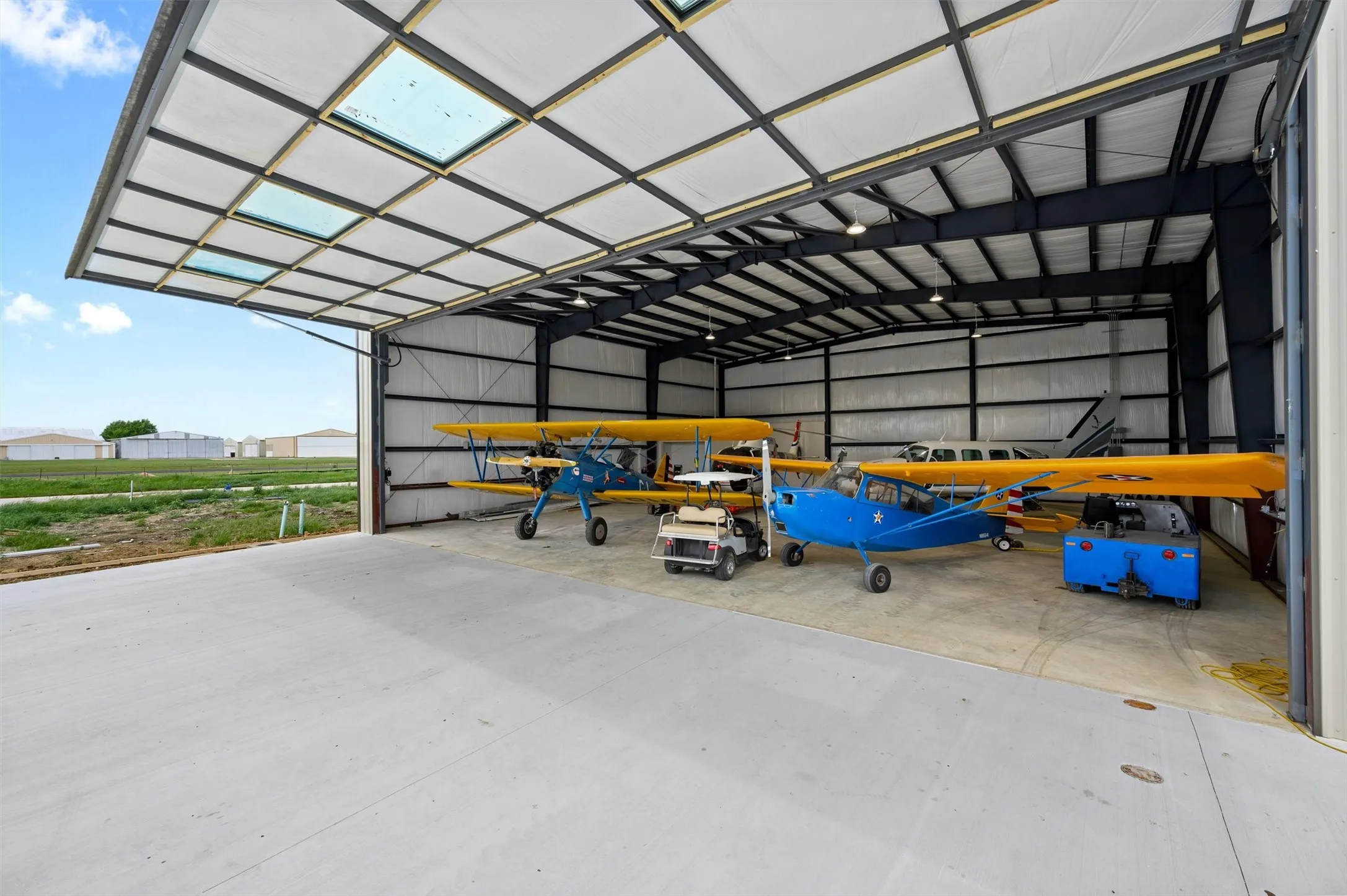 Photos of other new-construction hangars built at Aero Country East.