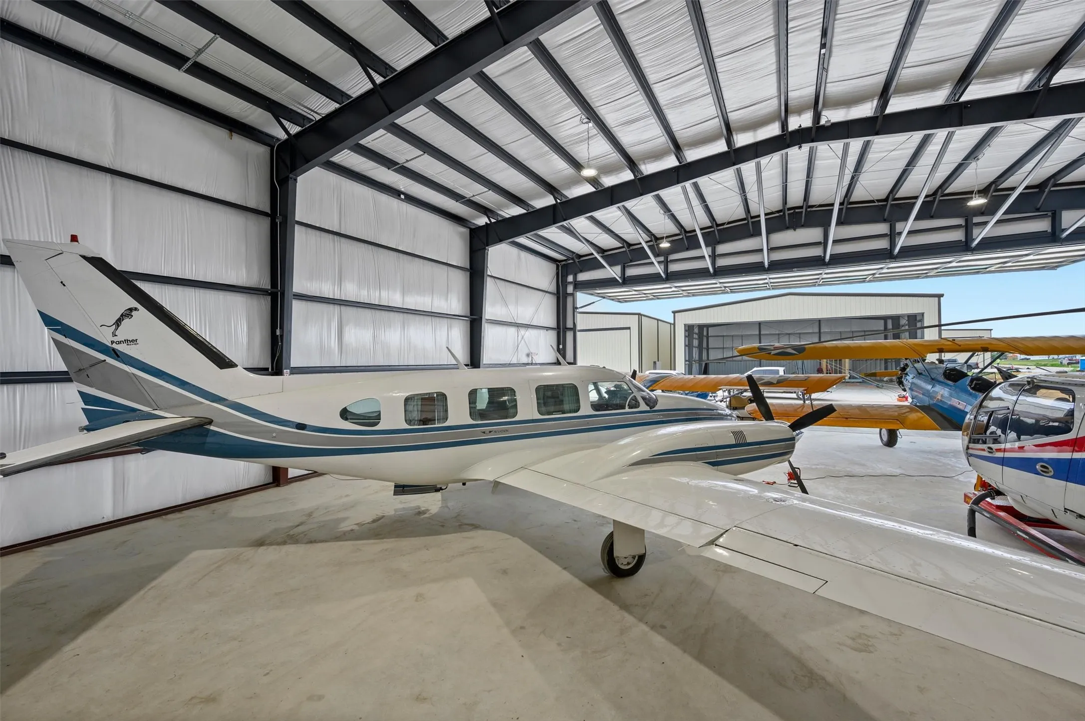 Photos of other new-construction hangars built at Aero Country East.