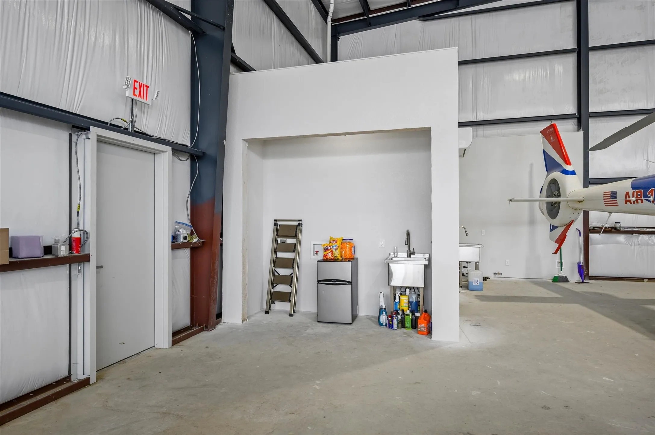 Photos of other new-construction hangars built at Aero Country East.