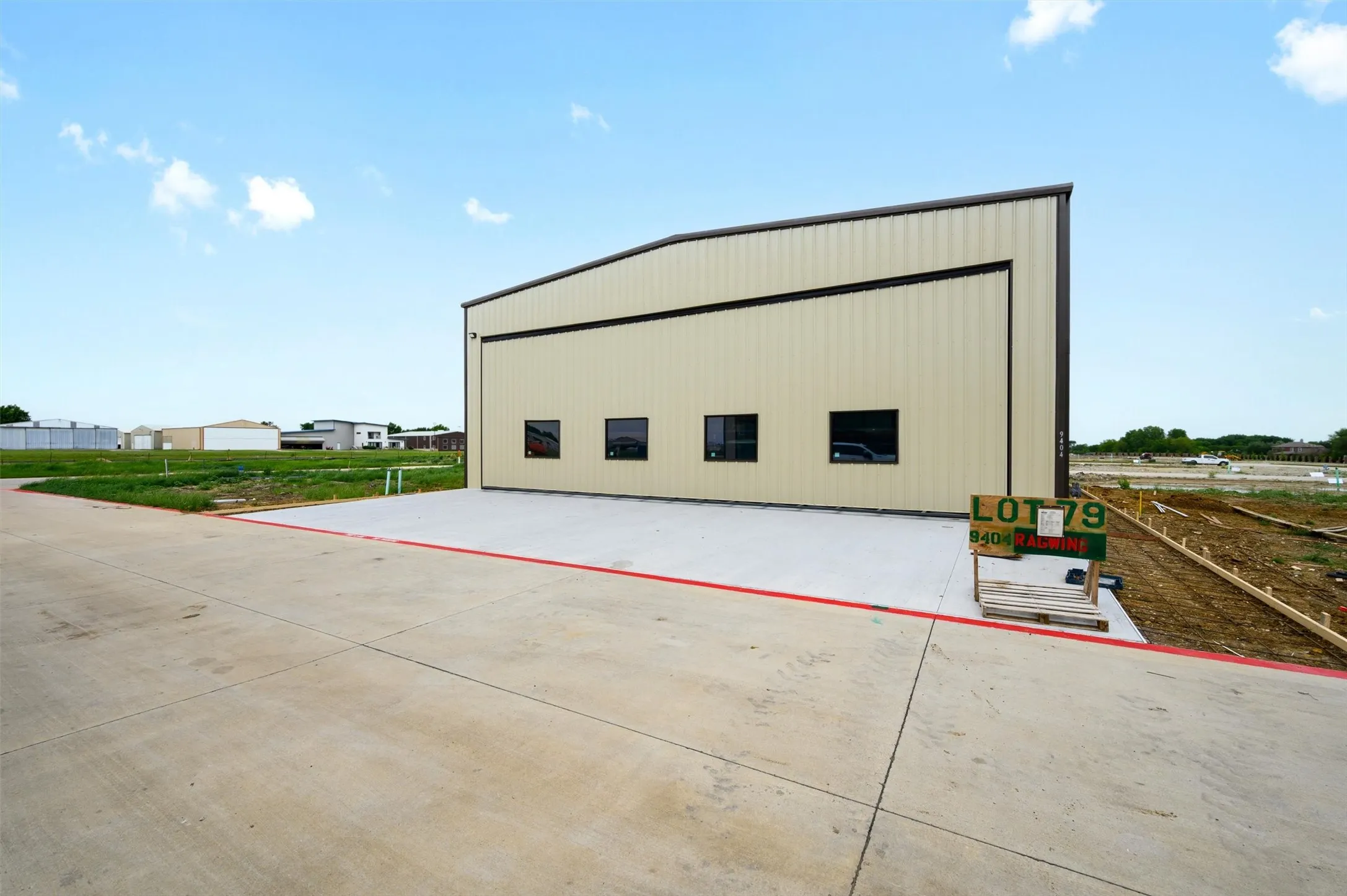 Photos of other new-construction hangars built at Aero Country East.