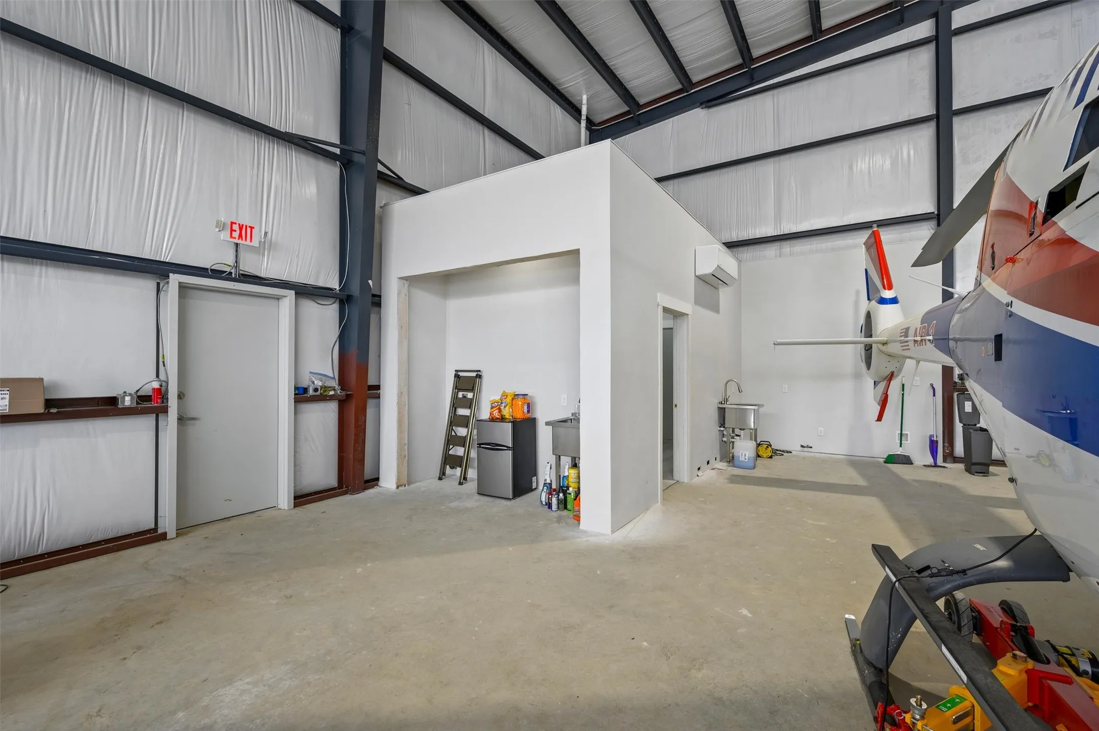 Photos of other new-construction hangars built at Aero Country East.