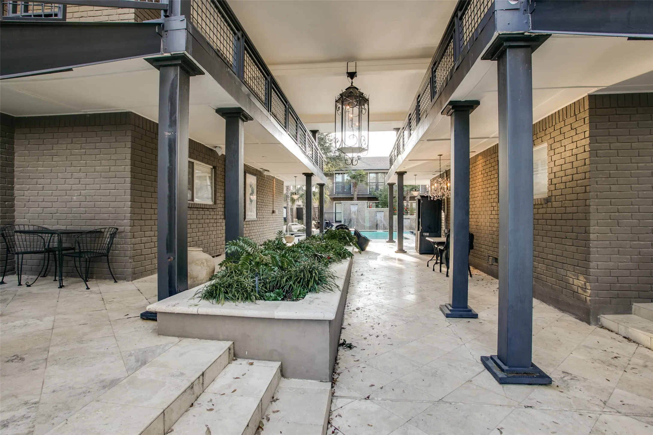 Beautiful walkway to closest pool and entertaining area.