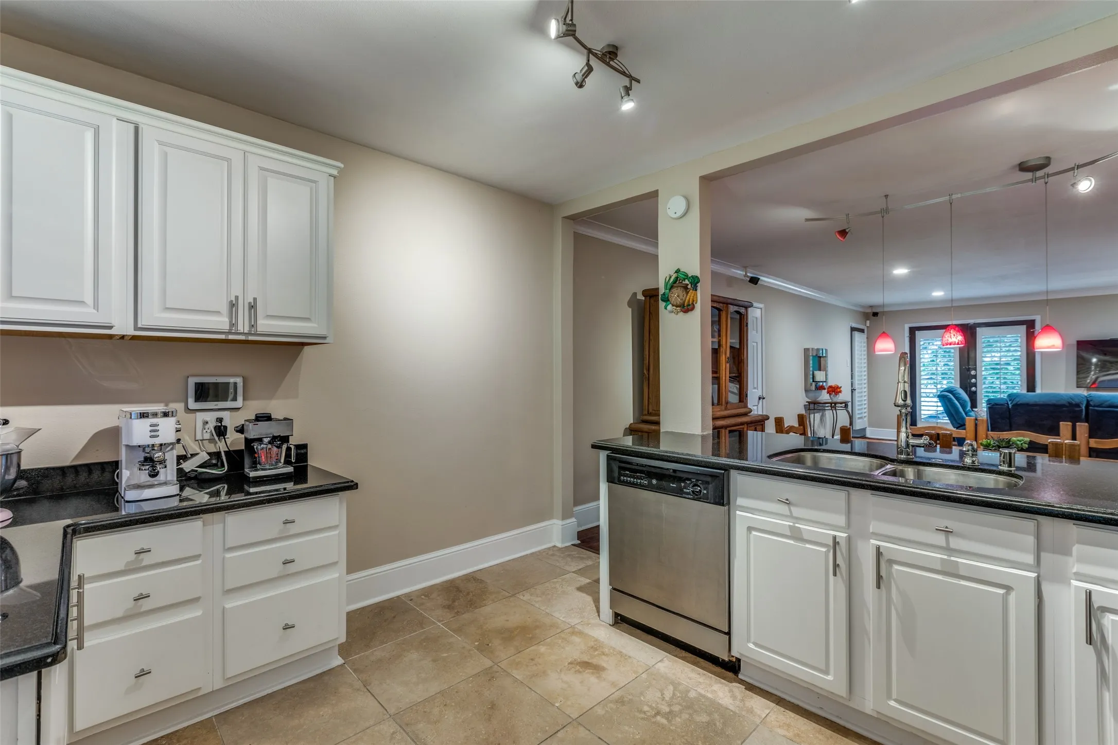 More storage in this beautiful kitchen and perfect spot for a coffee bar.