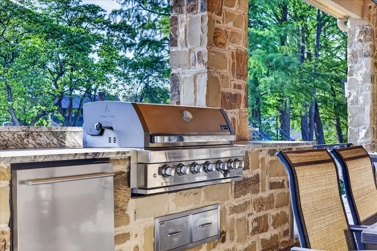 Refrigerator and build in stainless grill with rotisserie