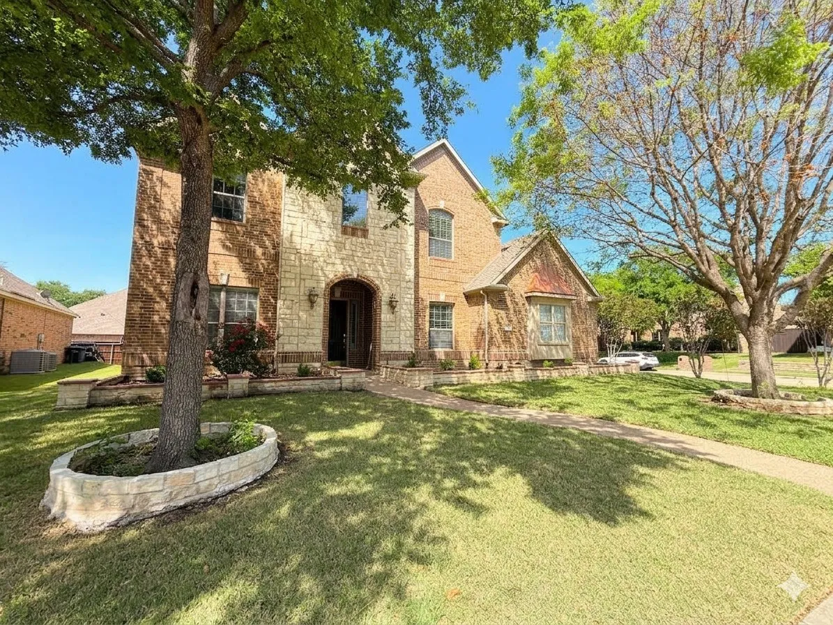Brick and stone exterior with arched entryway