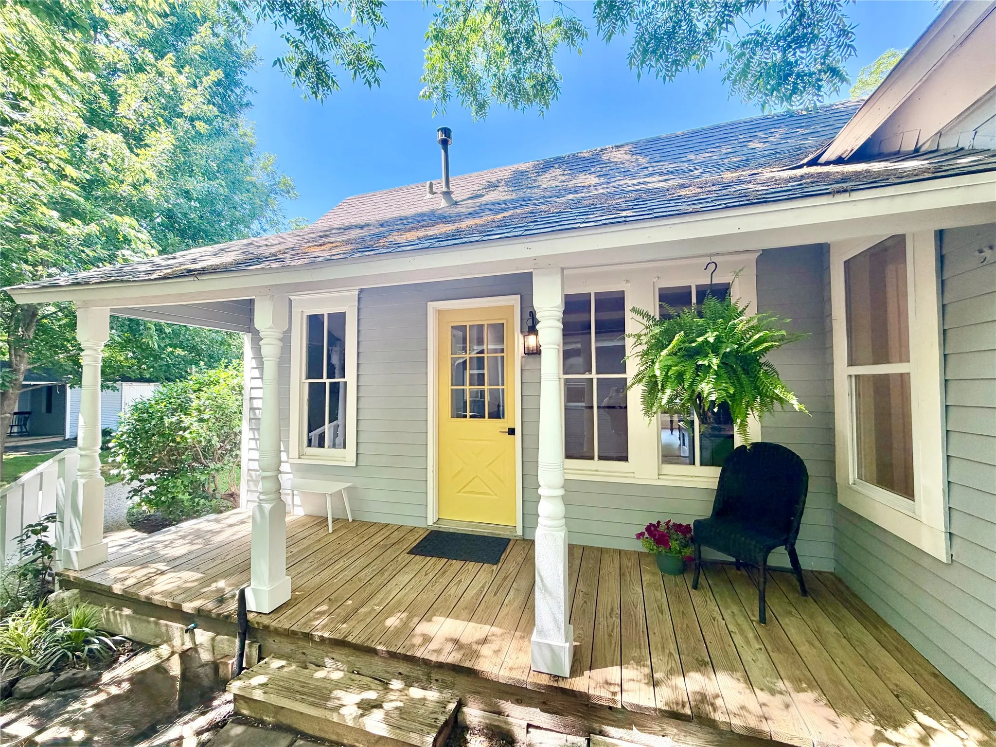 BACK PORCH WAS ORIGINALLY THE FRONT DOOR OF THE HOUSE ....