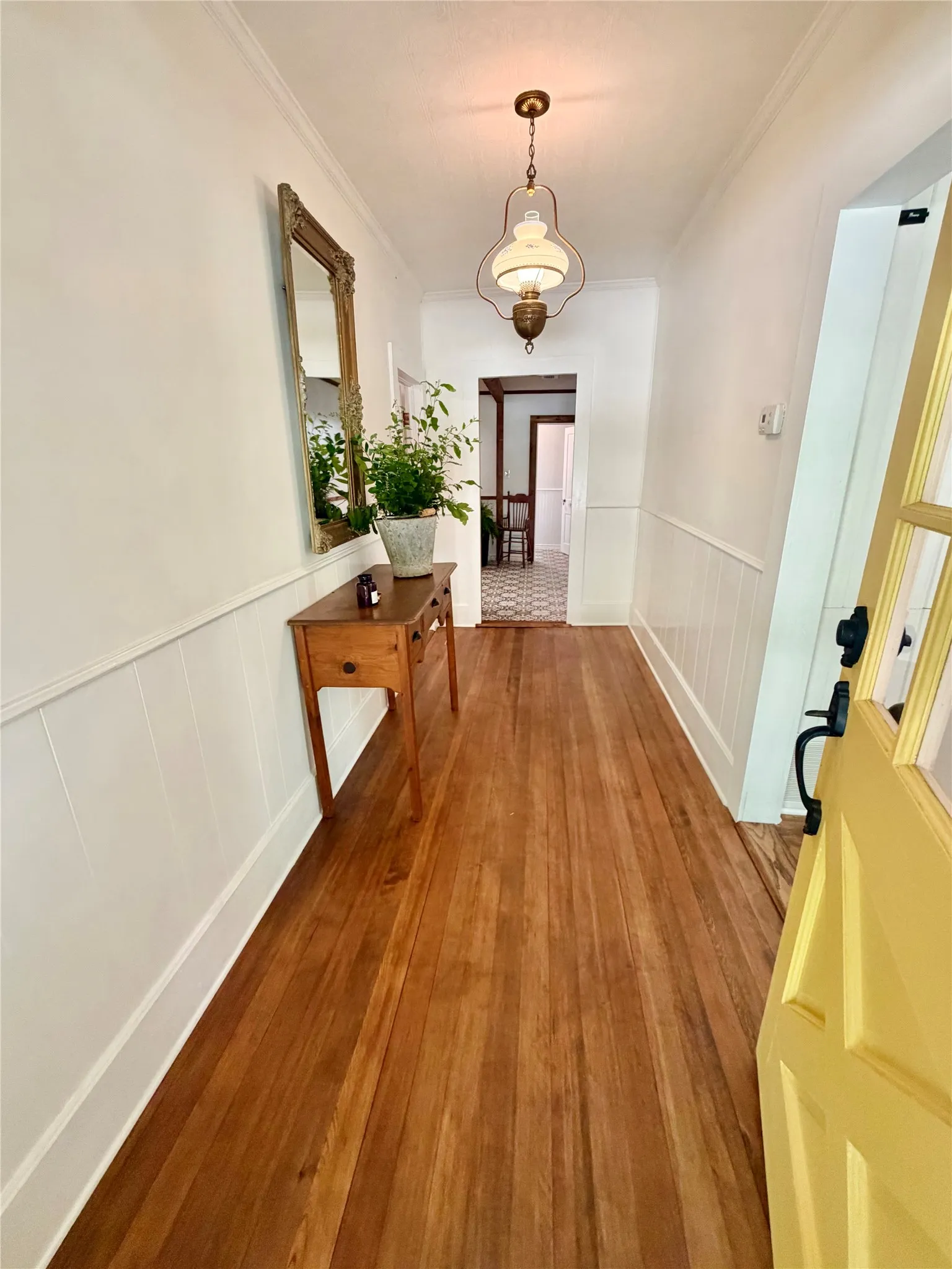 ENTRY WITH ORIGINAL HARDWOOD FLOORS