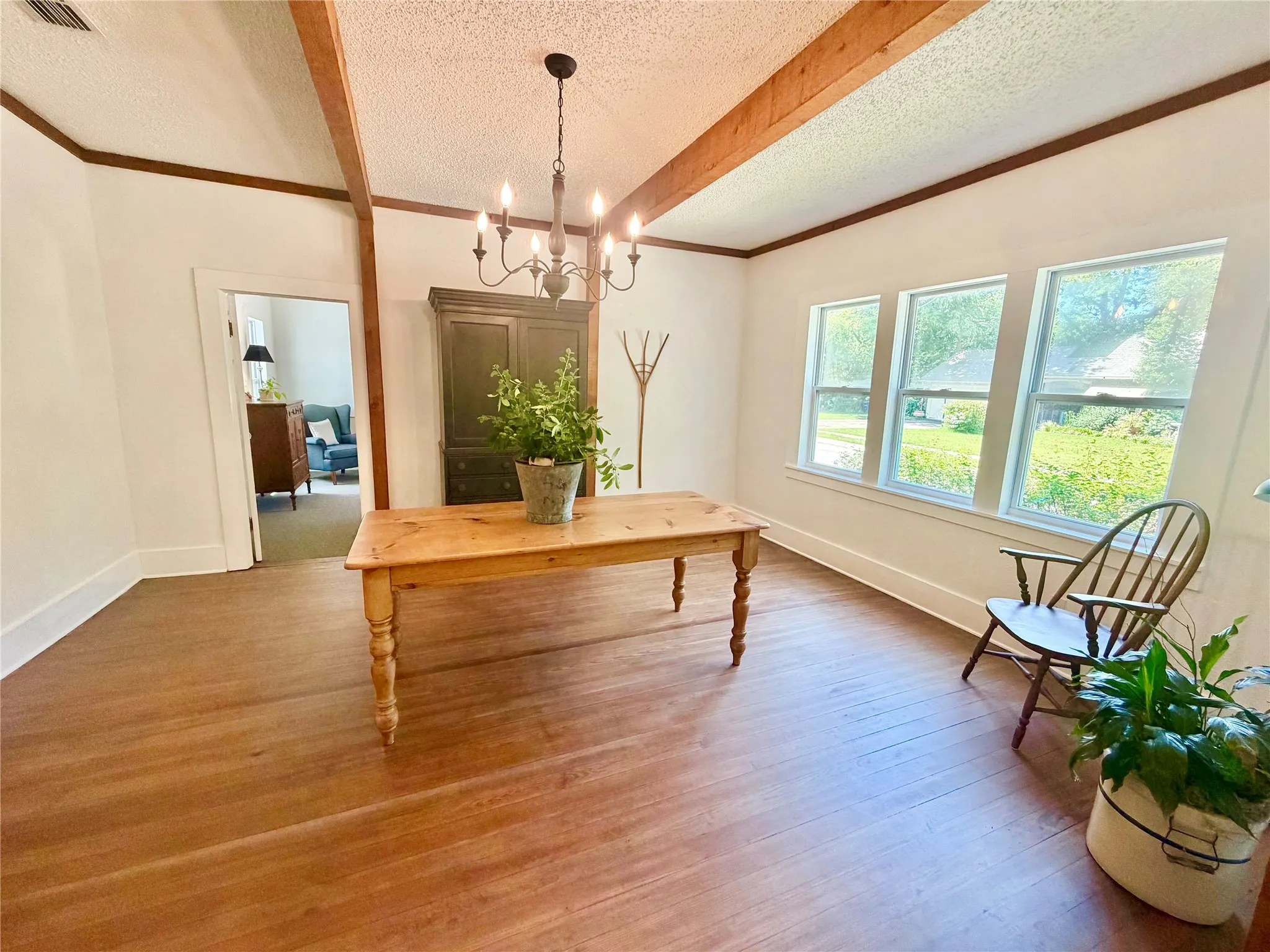 LARGE DINING ALSO FEATURES ORIGINAL HARDWOOD FLOORS