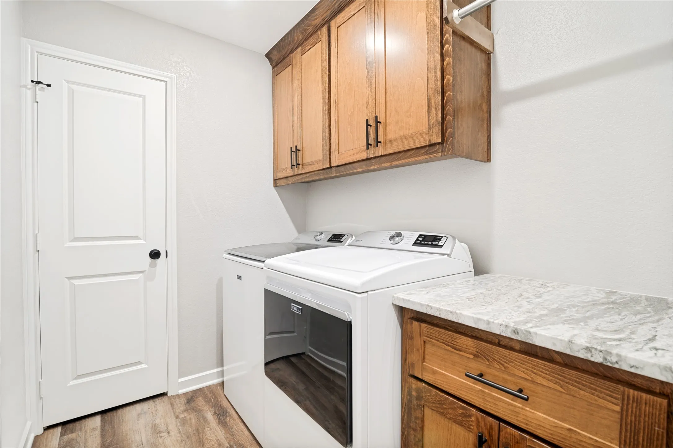 Seperate utility room with additional closet space.  The washer and dryer set are negoptiable with your offer.
