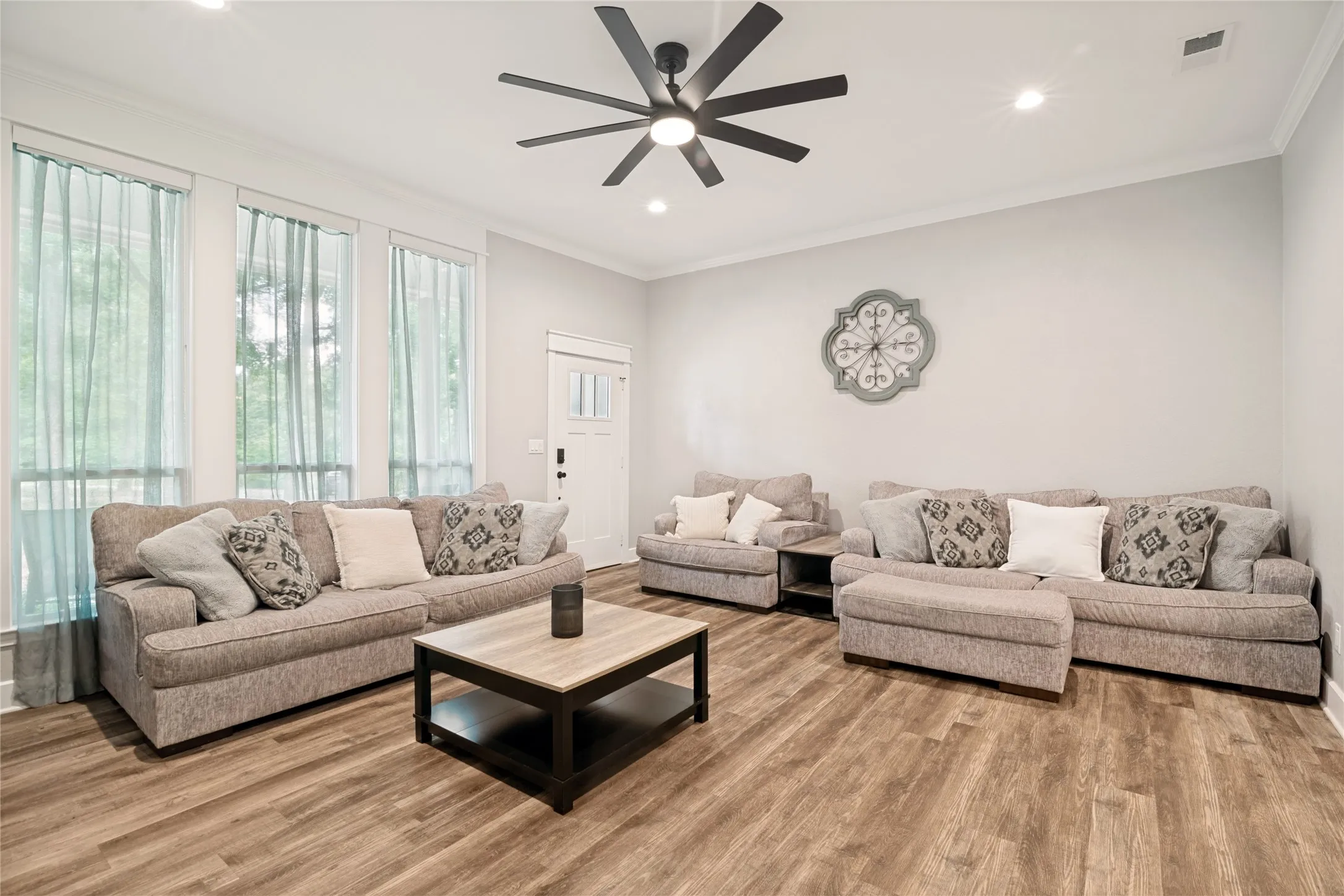 Living Room. No Carpet! Enjoy Commercial Grade Luxury Vinyl Plank Flooring throught the entire home.
