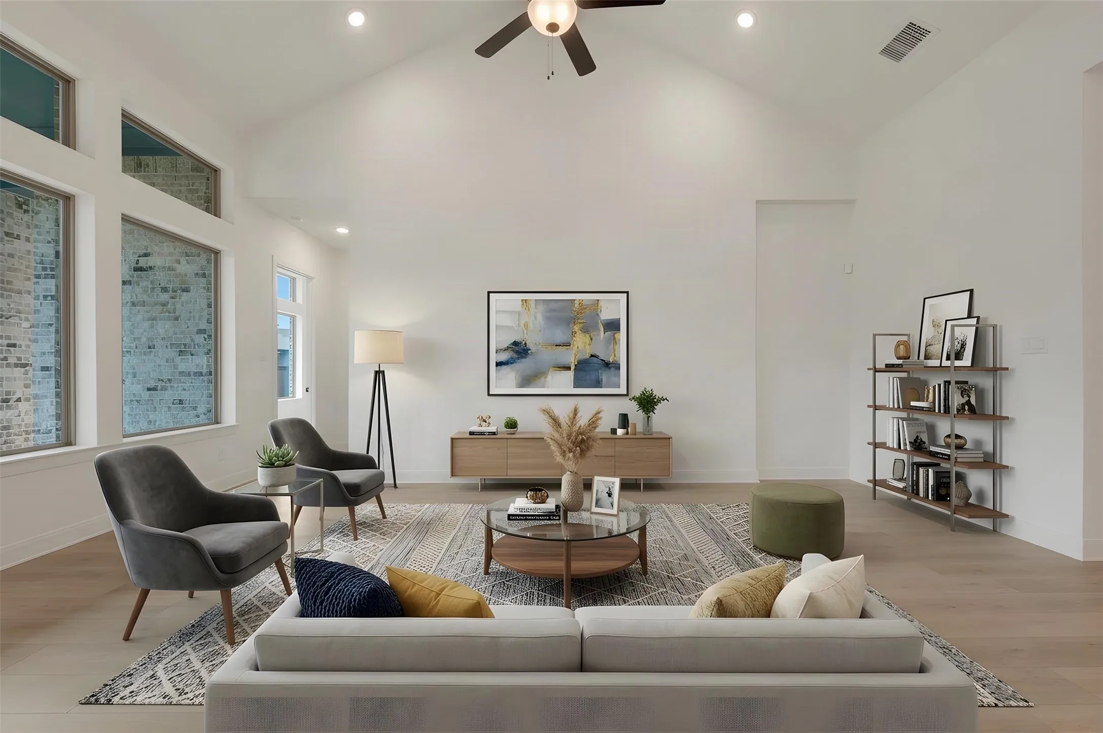 Vaulted ceiling with recessed lighting and a ceiling fan, wood-finish flooring, and large windows