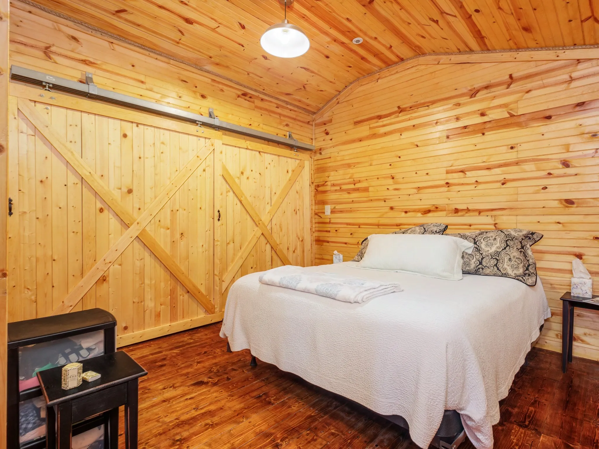 Utility room on left behind barn door and closet on the right.