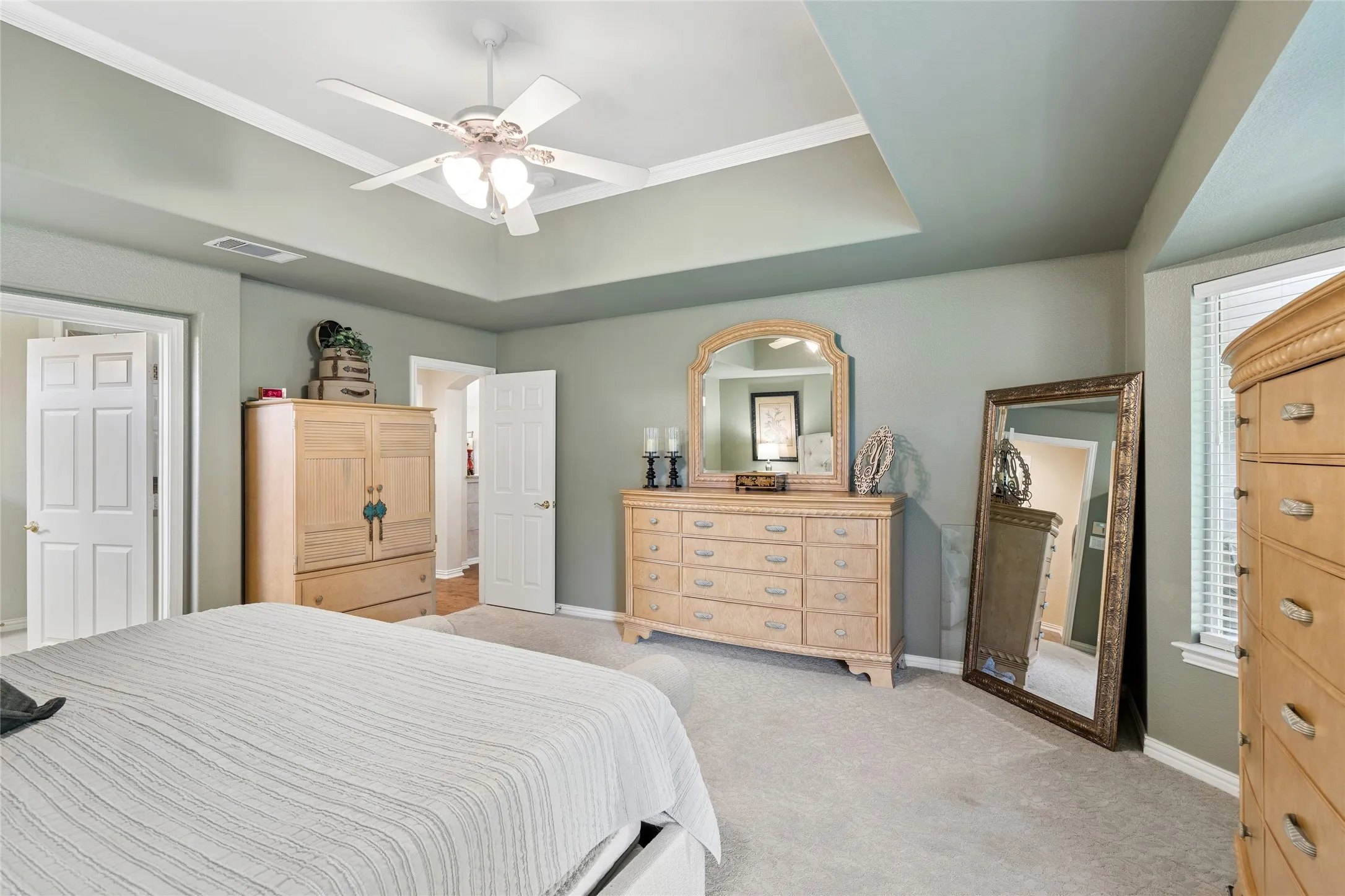 The primary bedroom could accommodate a small sitting area